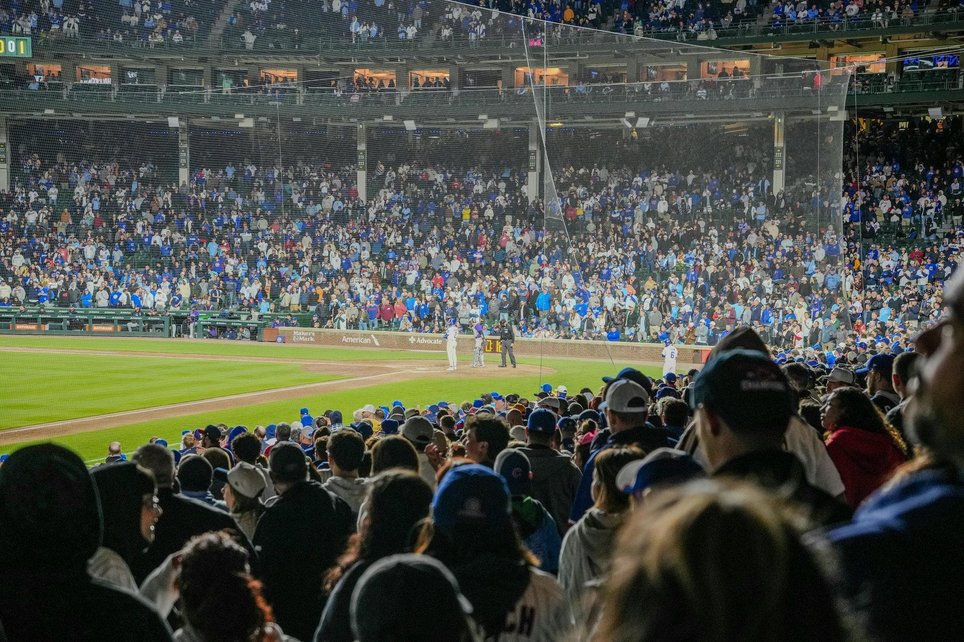 woman wearing yellow long-sleeved dress under white clouds and blue sky during daytime