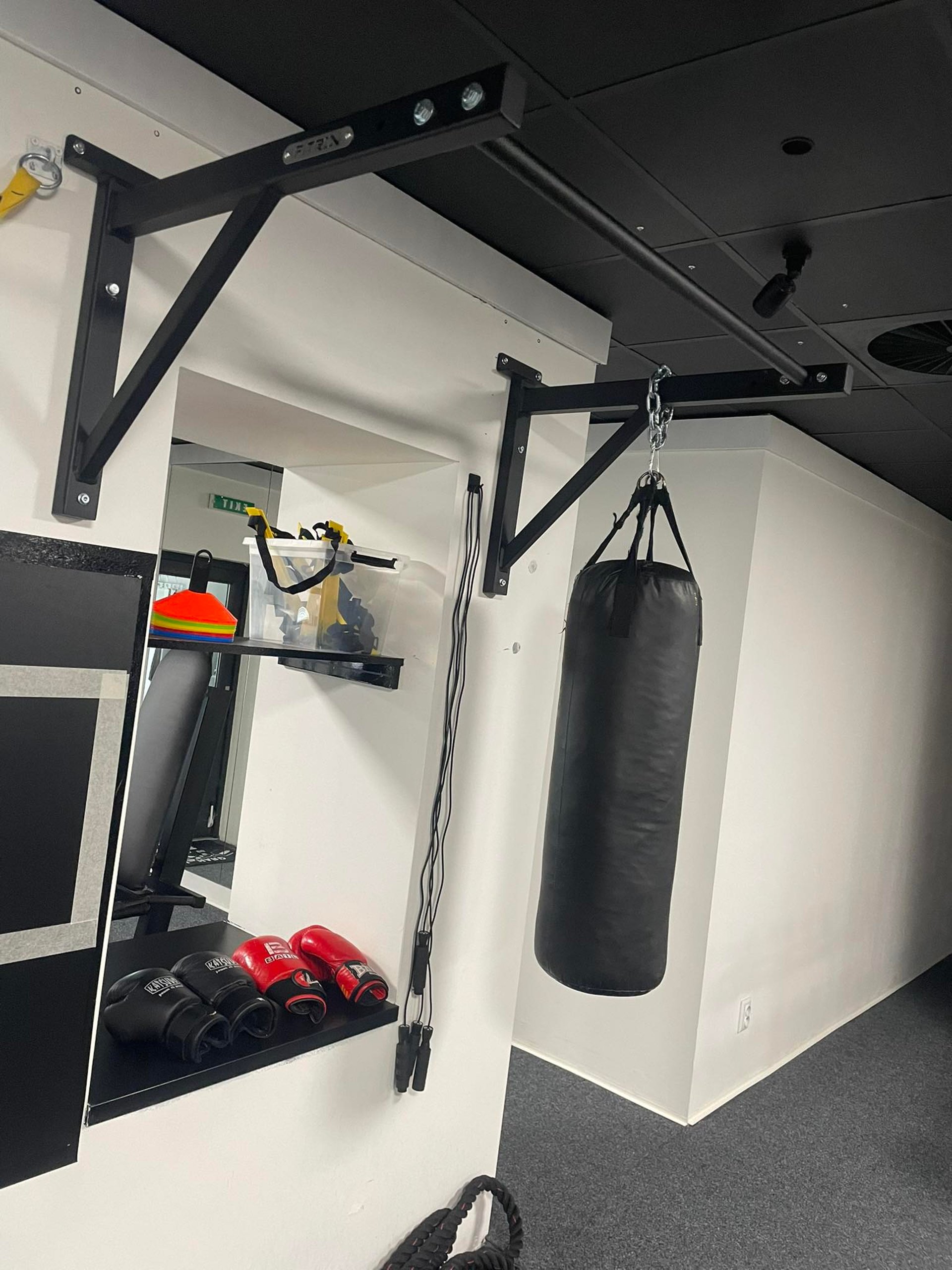 black and brown leather padded tub sofa