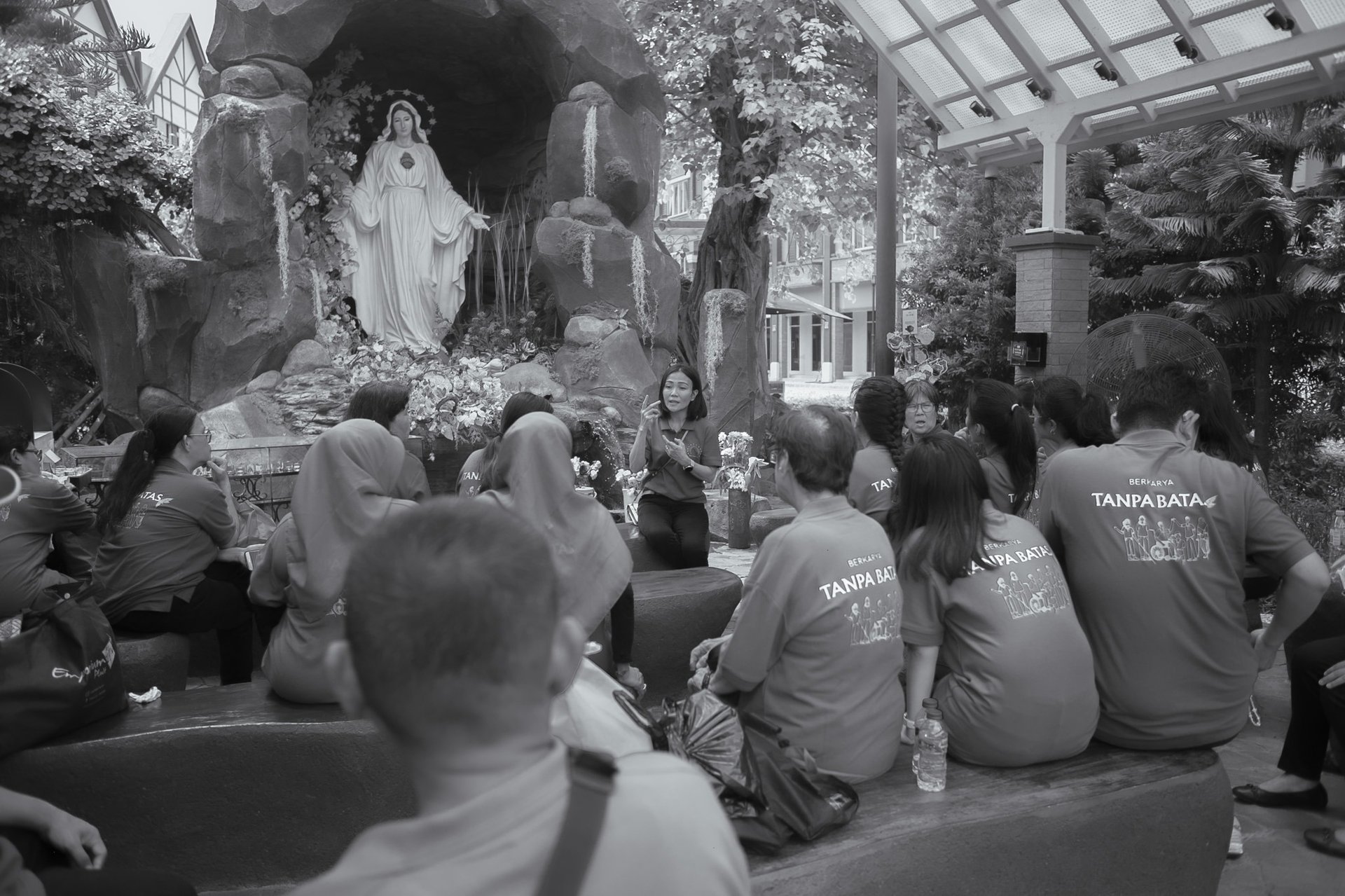 an abstract photo of a curved building with a blue sky in the background