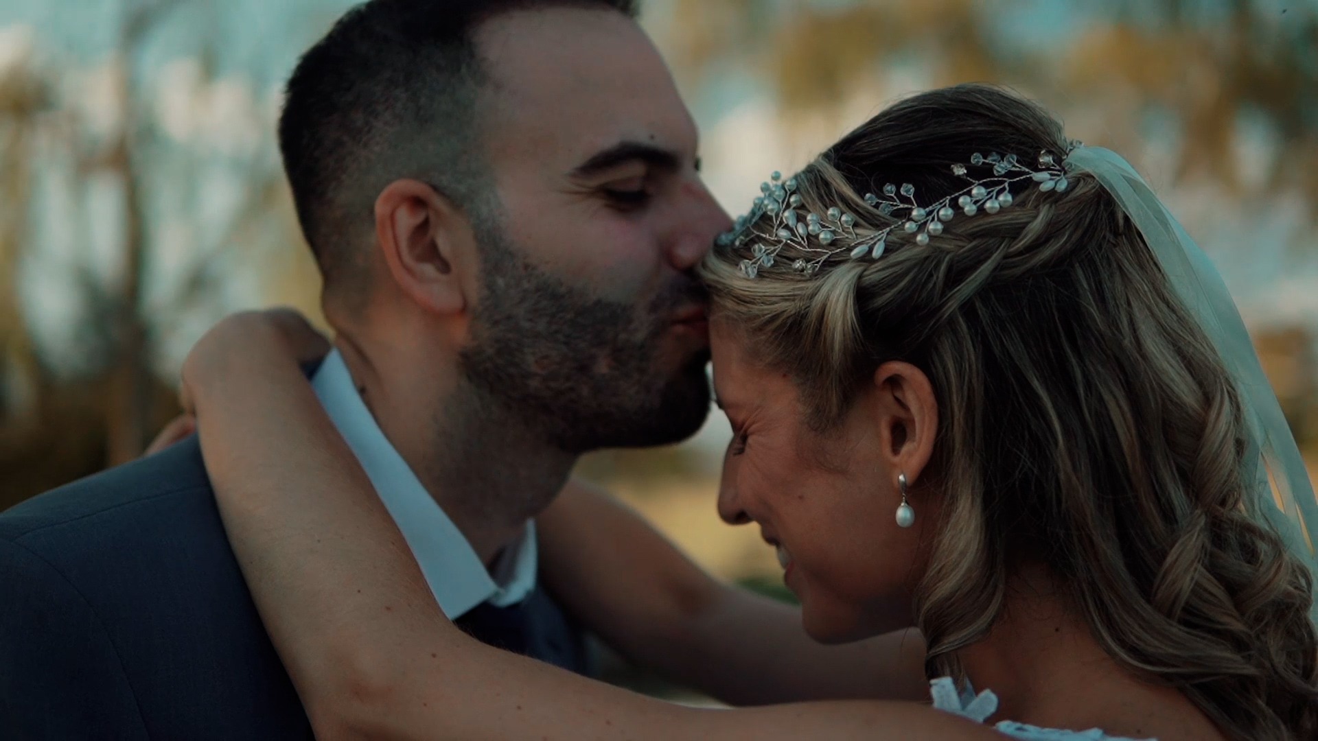 an abstract photo of a curved building with a blue sky in the background
