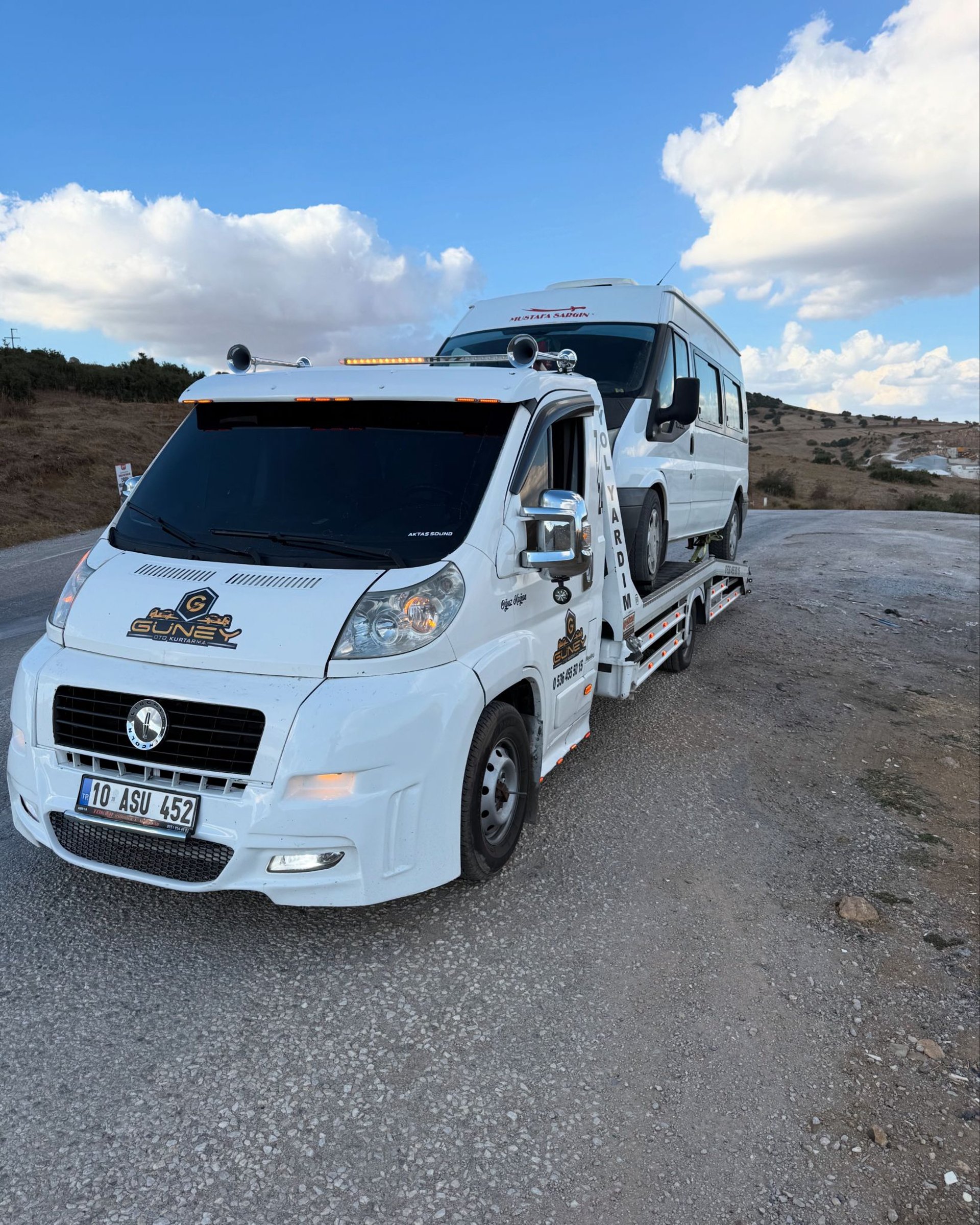 black and brown leather padded tub sofa