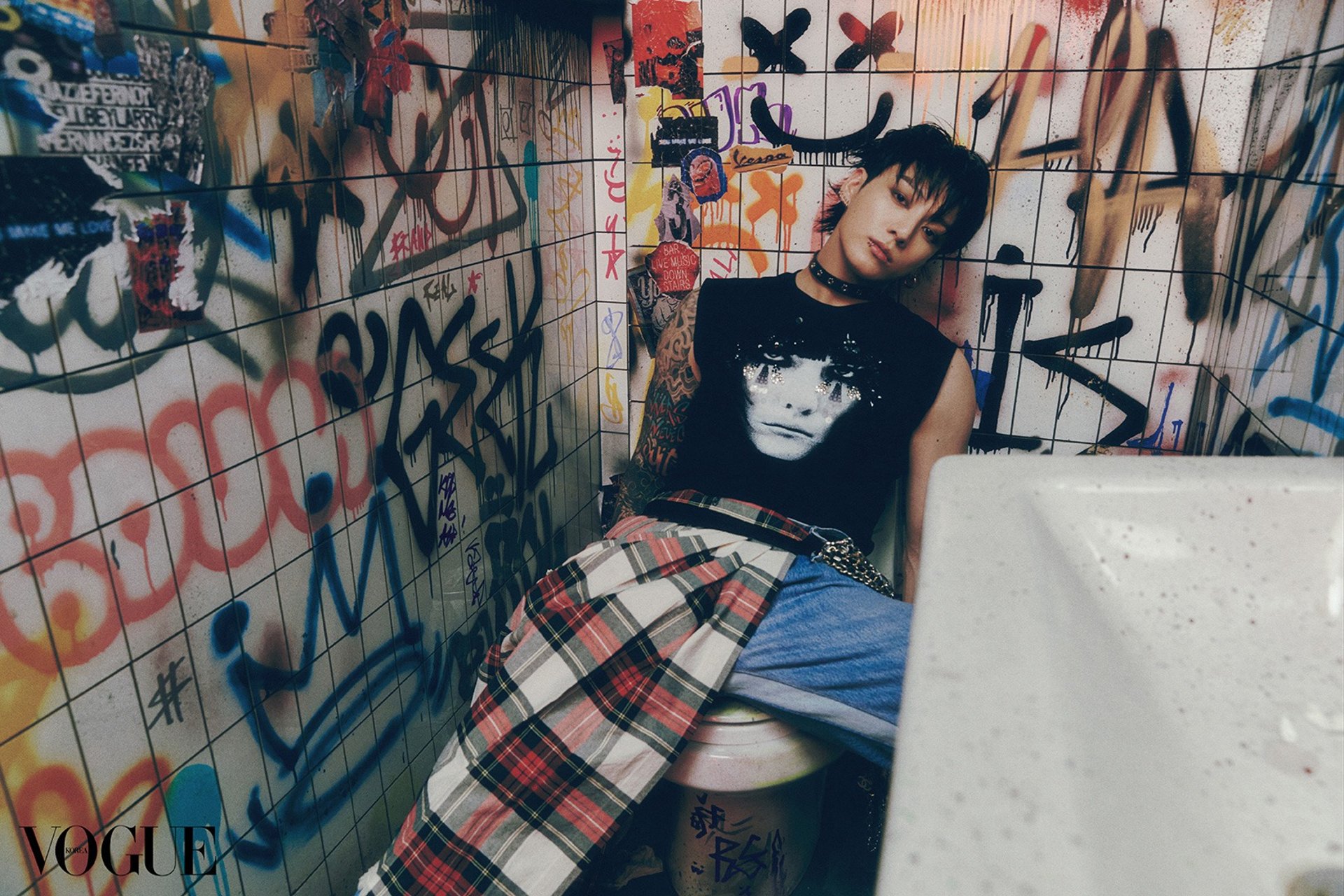 an abstract photo of a curved building with a blue sky in the background