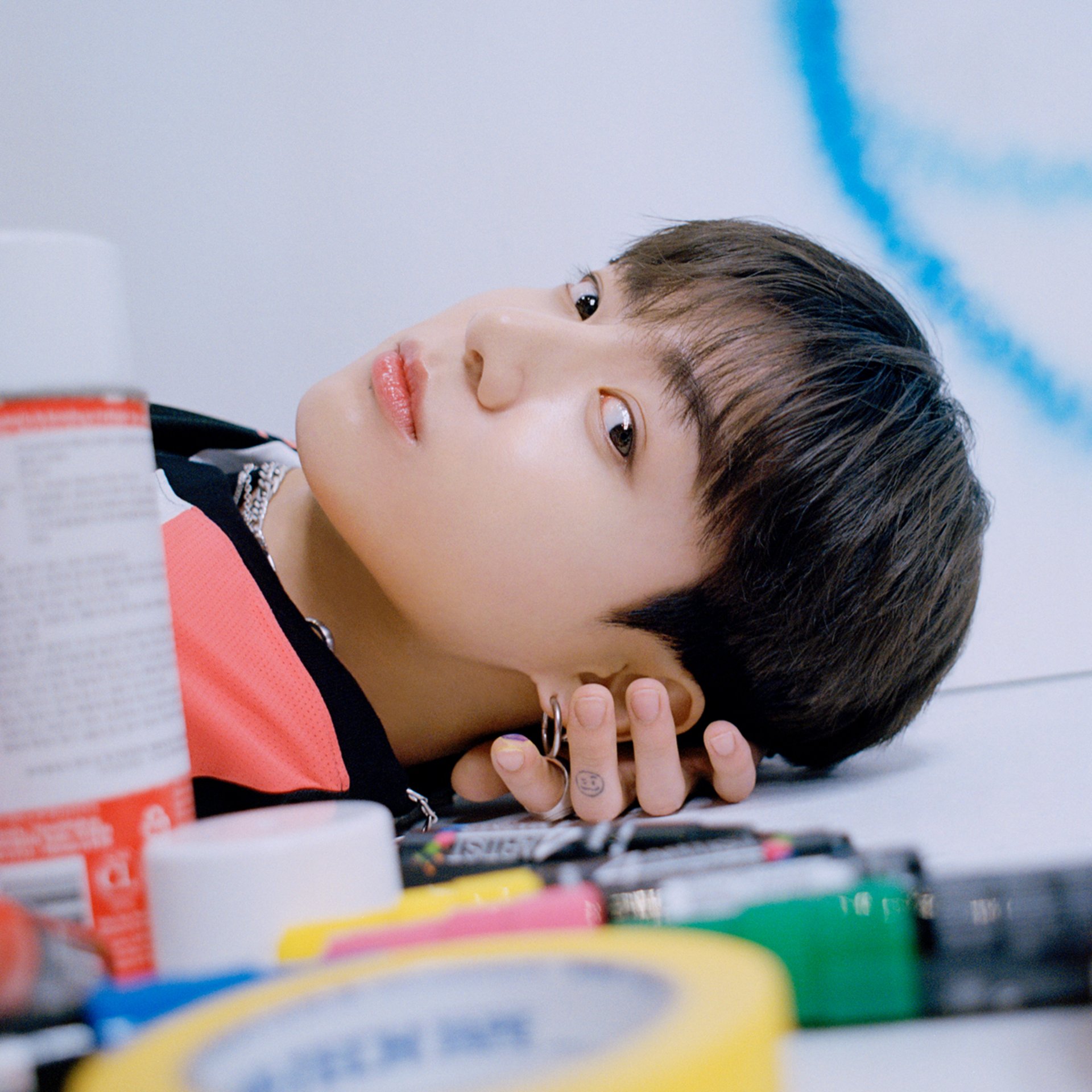 an abstract photo of a curved building with a blue sky in the background