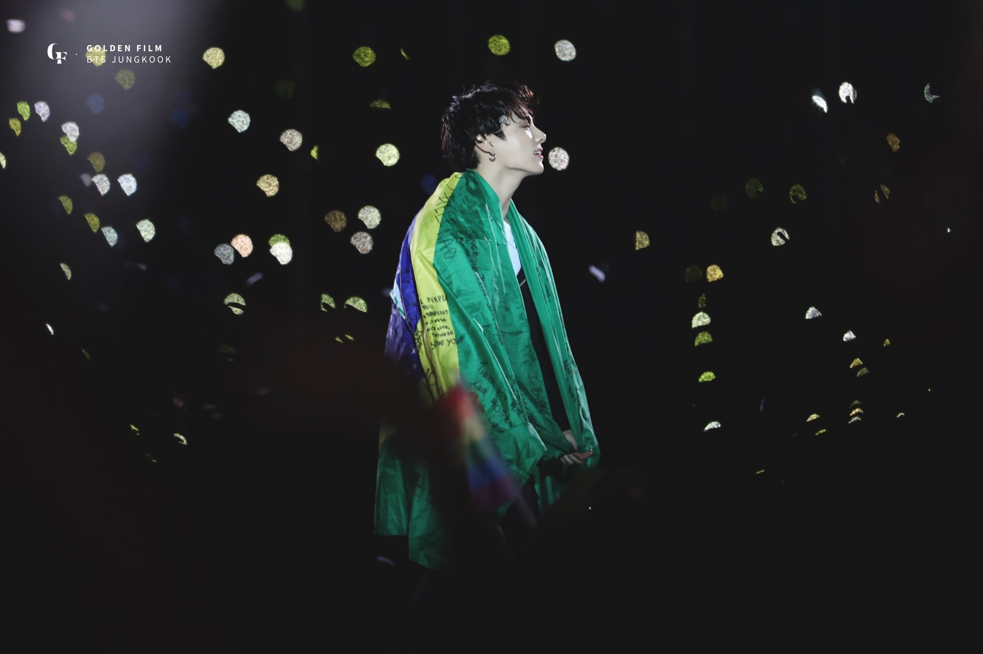 an abstract photo of a curved building with a blue sky in the background