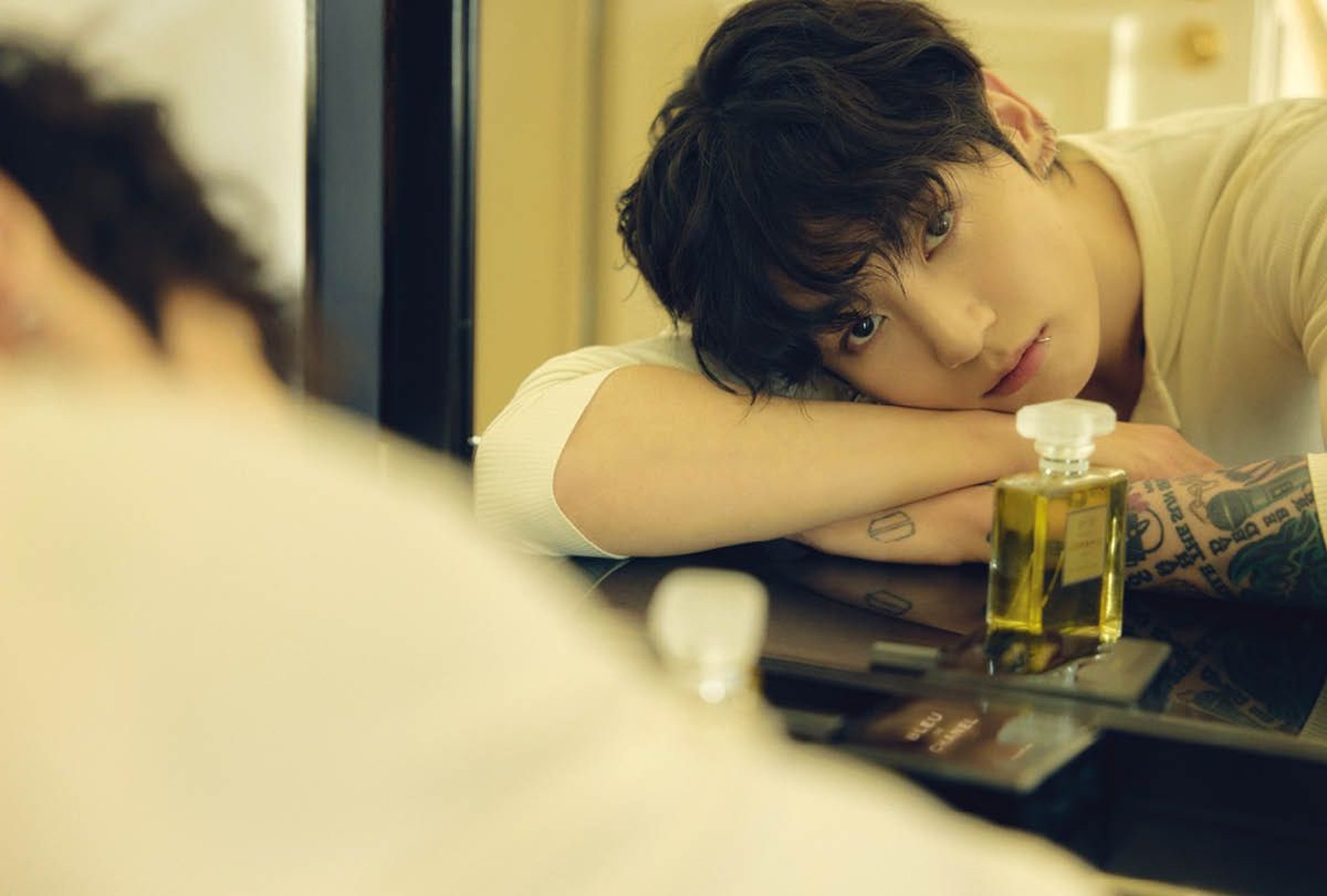 an abstract photo of a curved building with a blue sky in the background