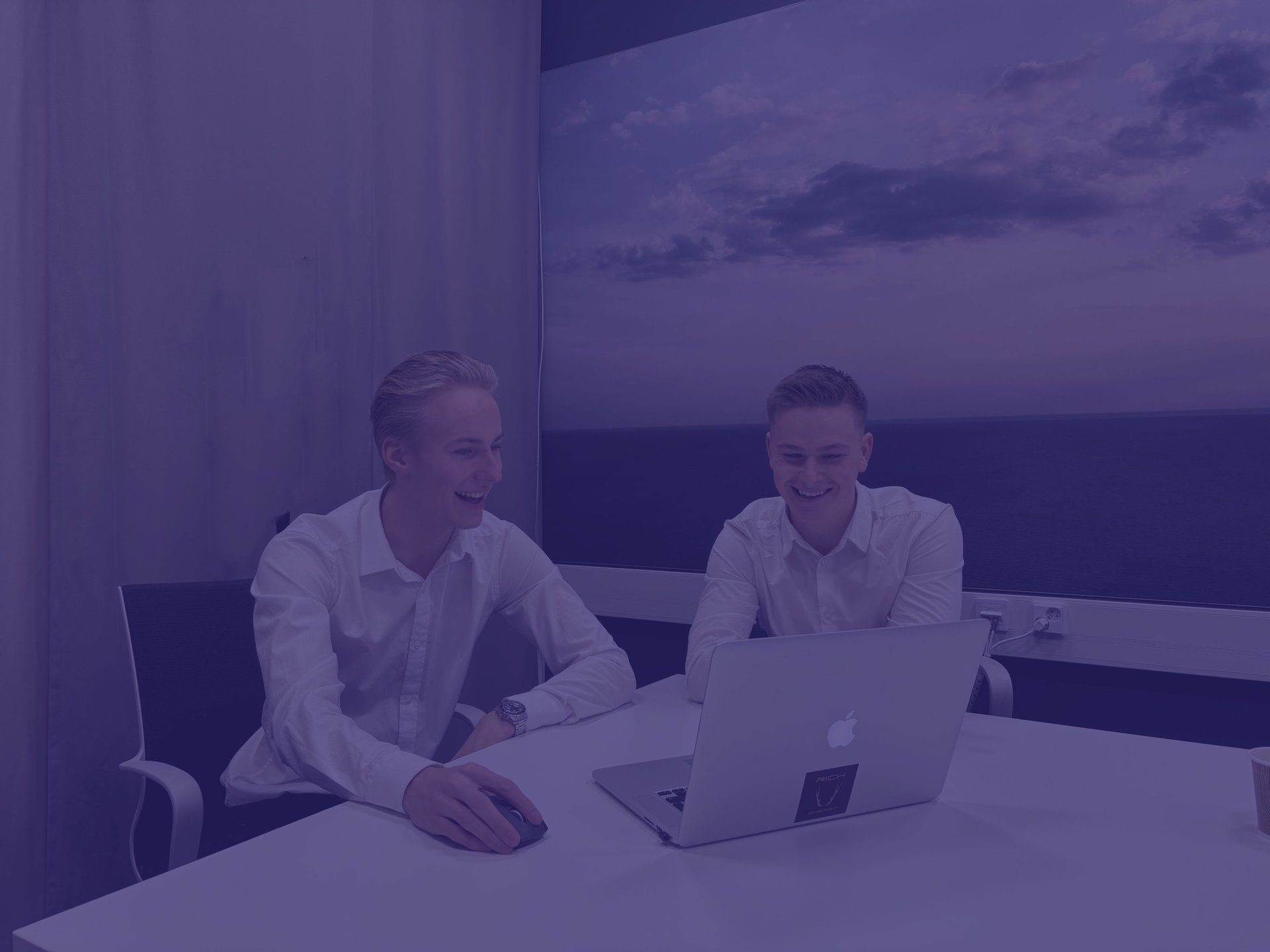 black and brown leather padded tub sofa