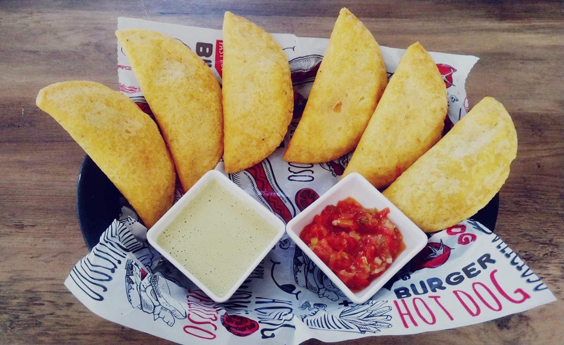 woman wearing yellow long-sleeved dress under white clouds and blue sky during daytime