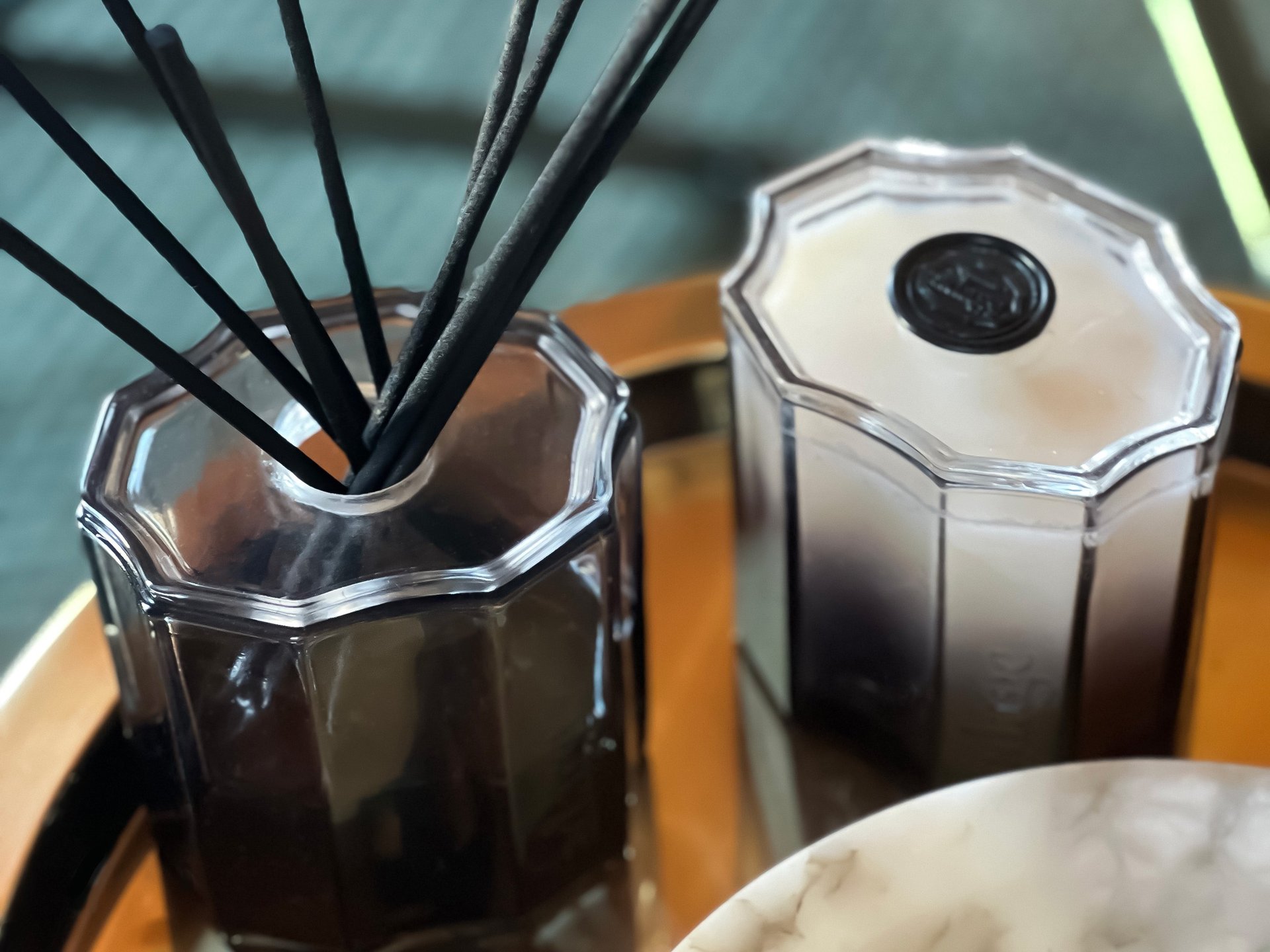 an abstract photo of a curved building with a blue sky in the background
