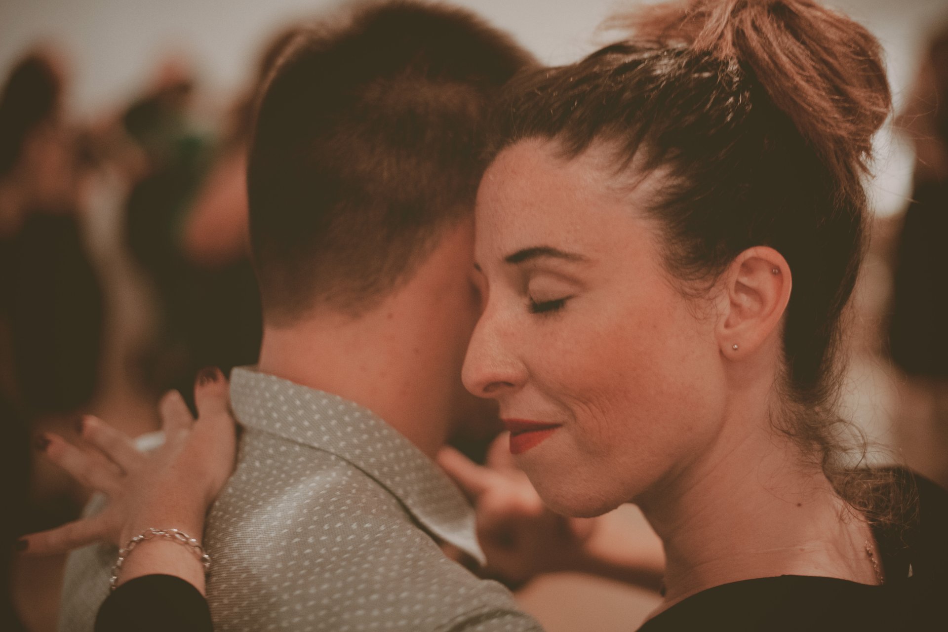 an abstract photo of a curved building with a blue sky in the background