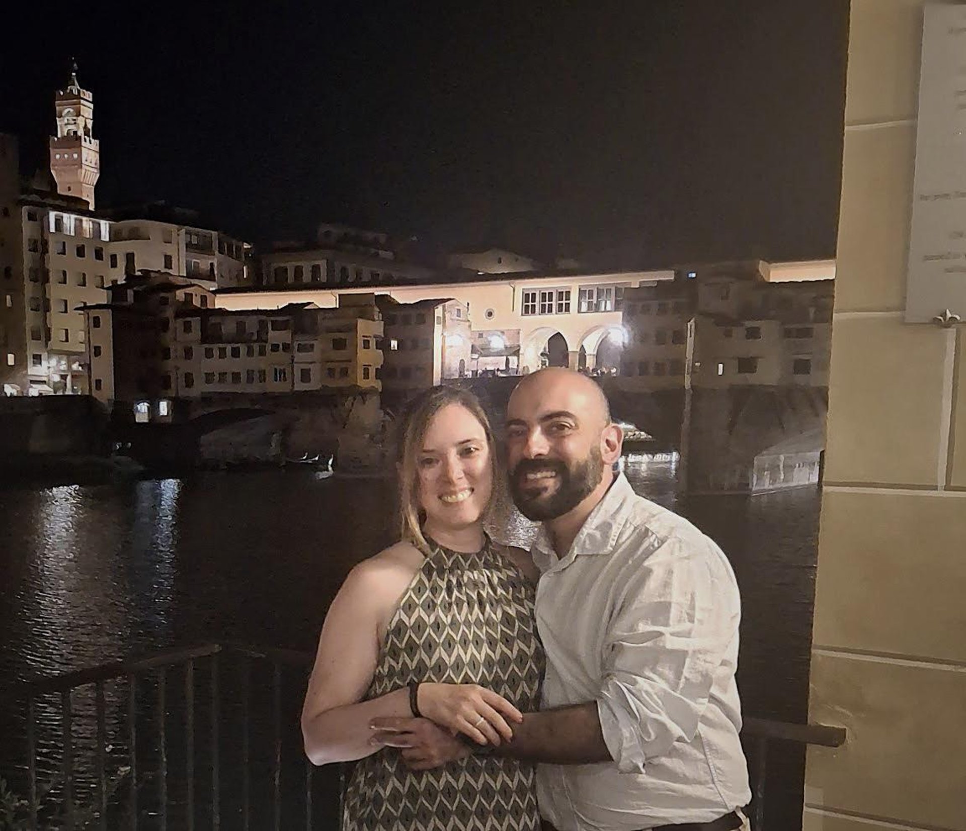 couple wearing silver-colored rings