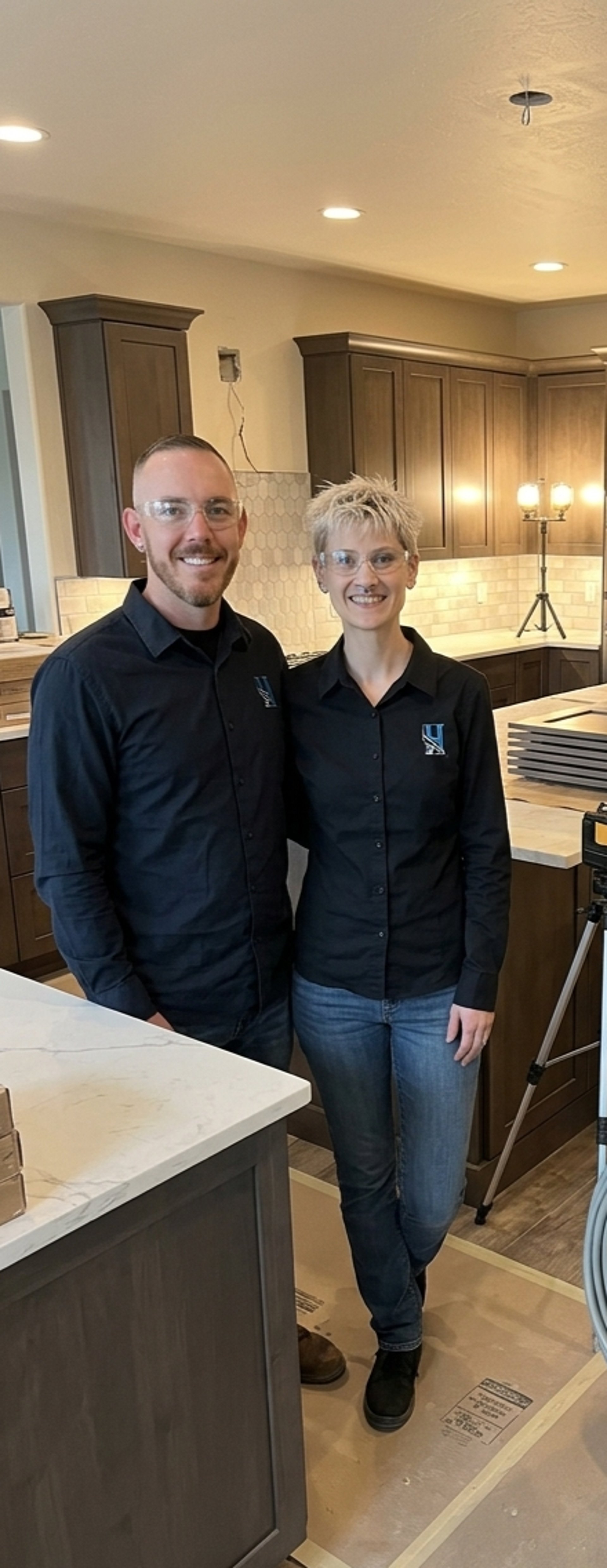 black and brown leather padded tub sofa