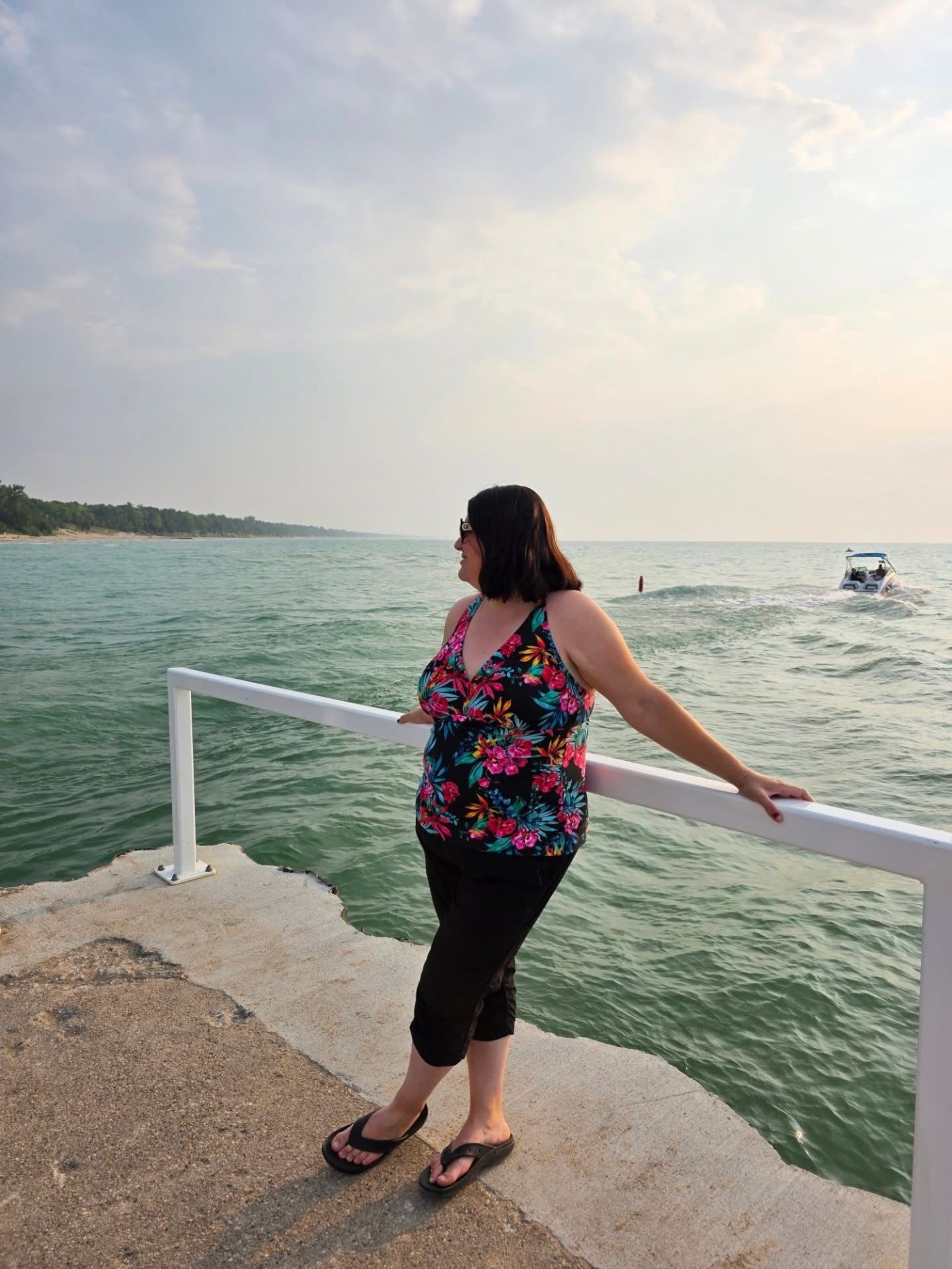 an abstract photo of a curved building with a blue sky in the background