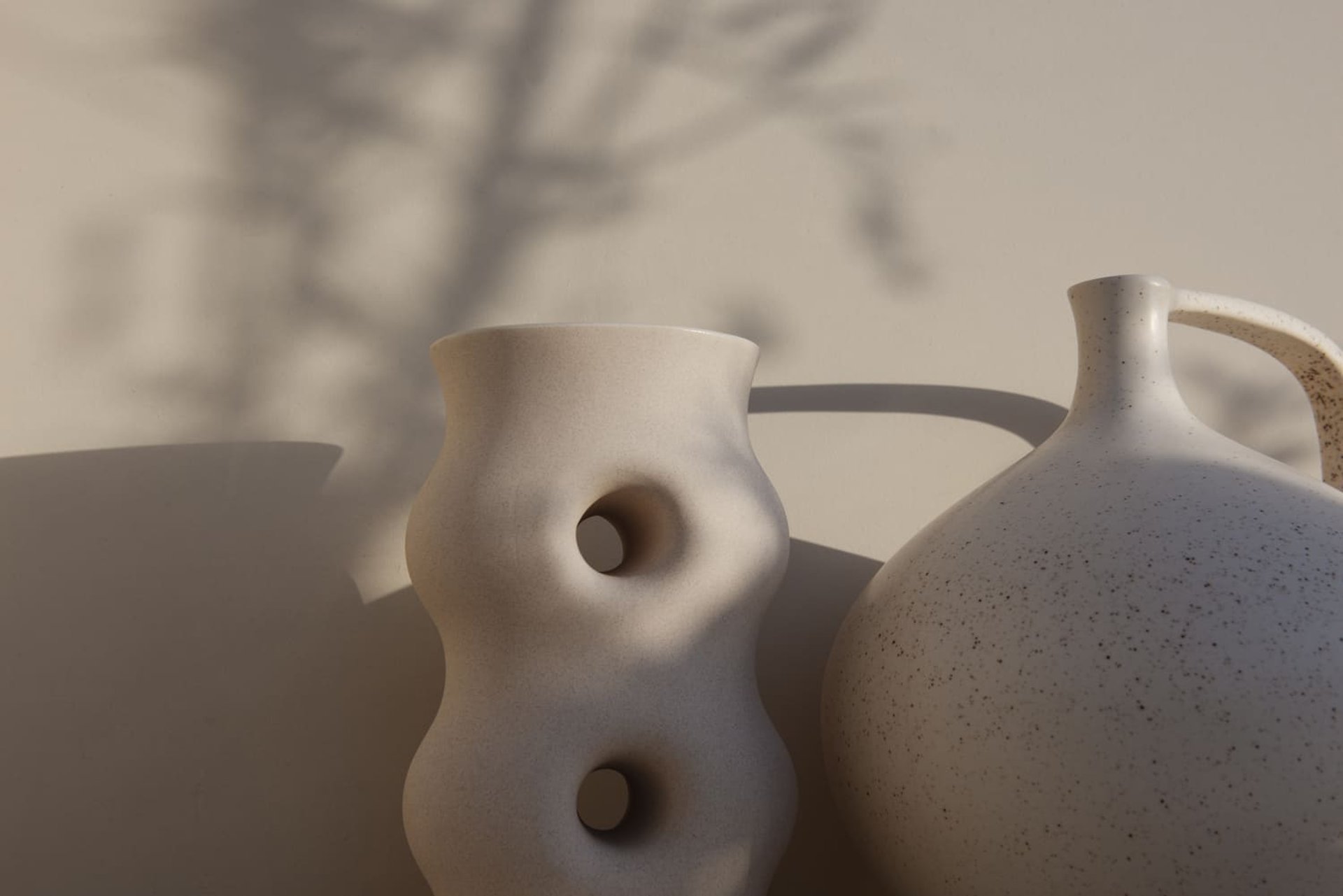 a small toy dog sitting on top of a couch