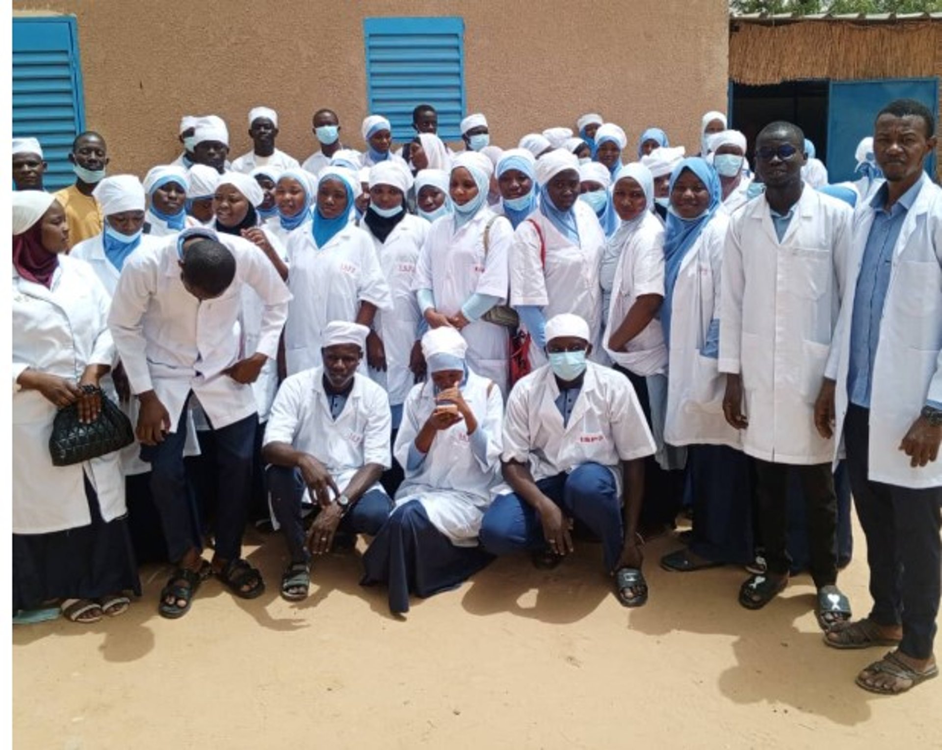 woman wearing yellow long-sleeved dress under white clouds and blue sky during daytime