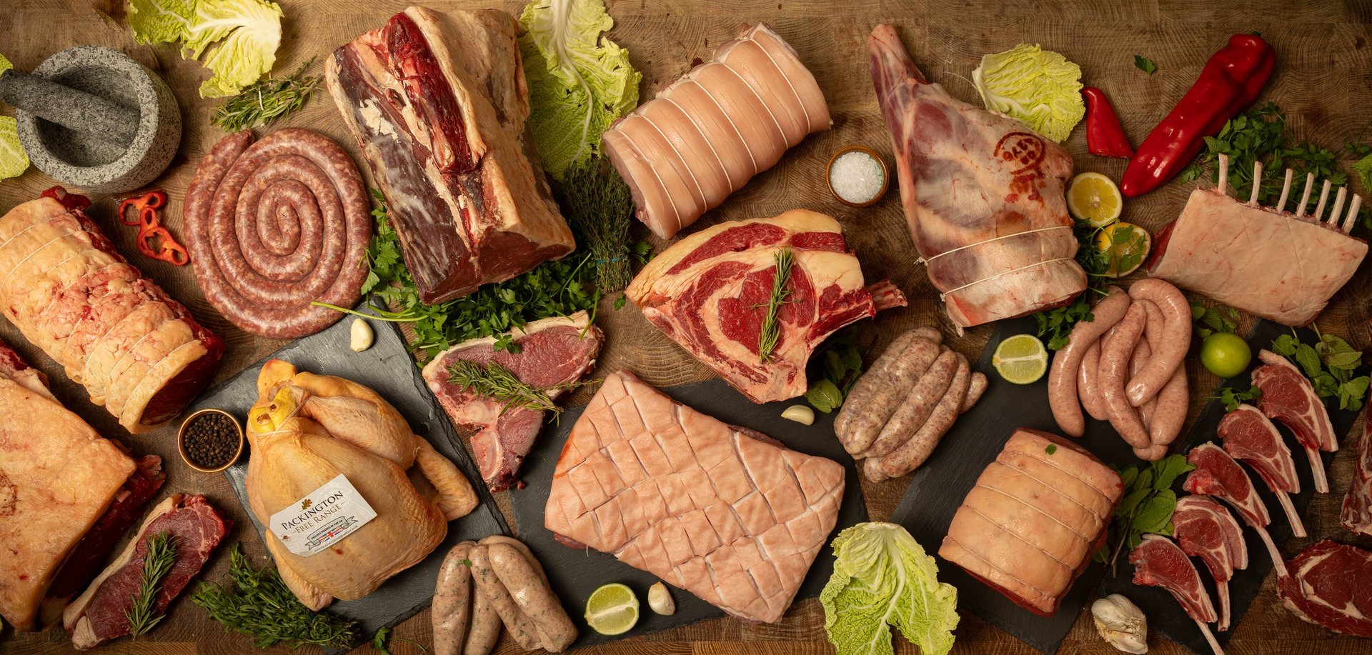 A display of meat hanging in a store