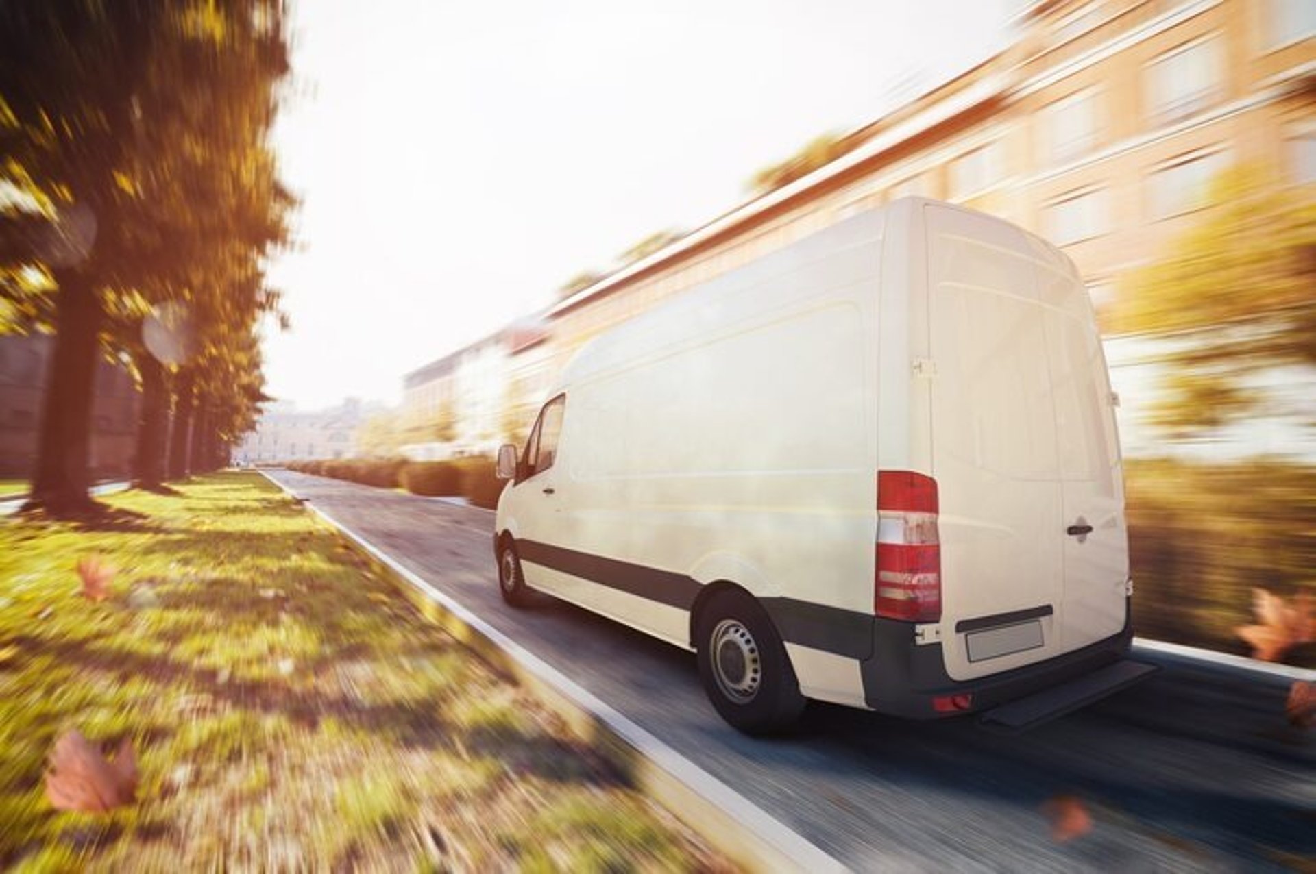 an abstract photo of a curved building with a blue sky in the background