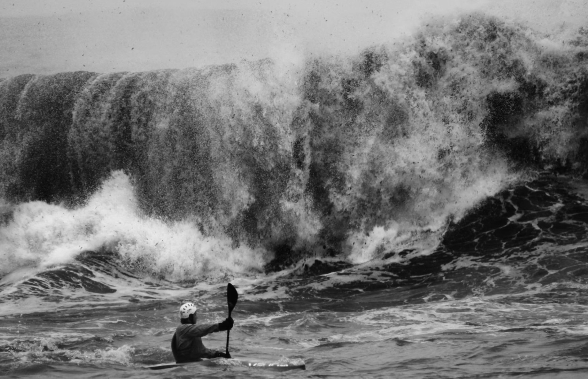 Horse race with spectators and green rolling hills