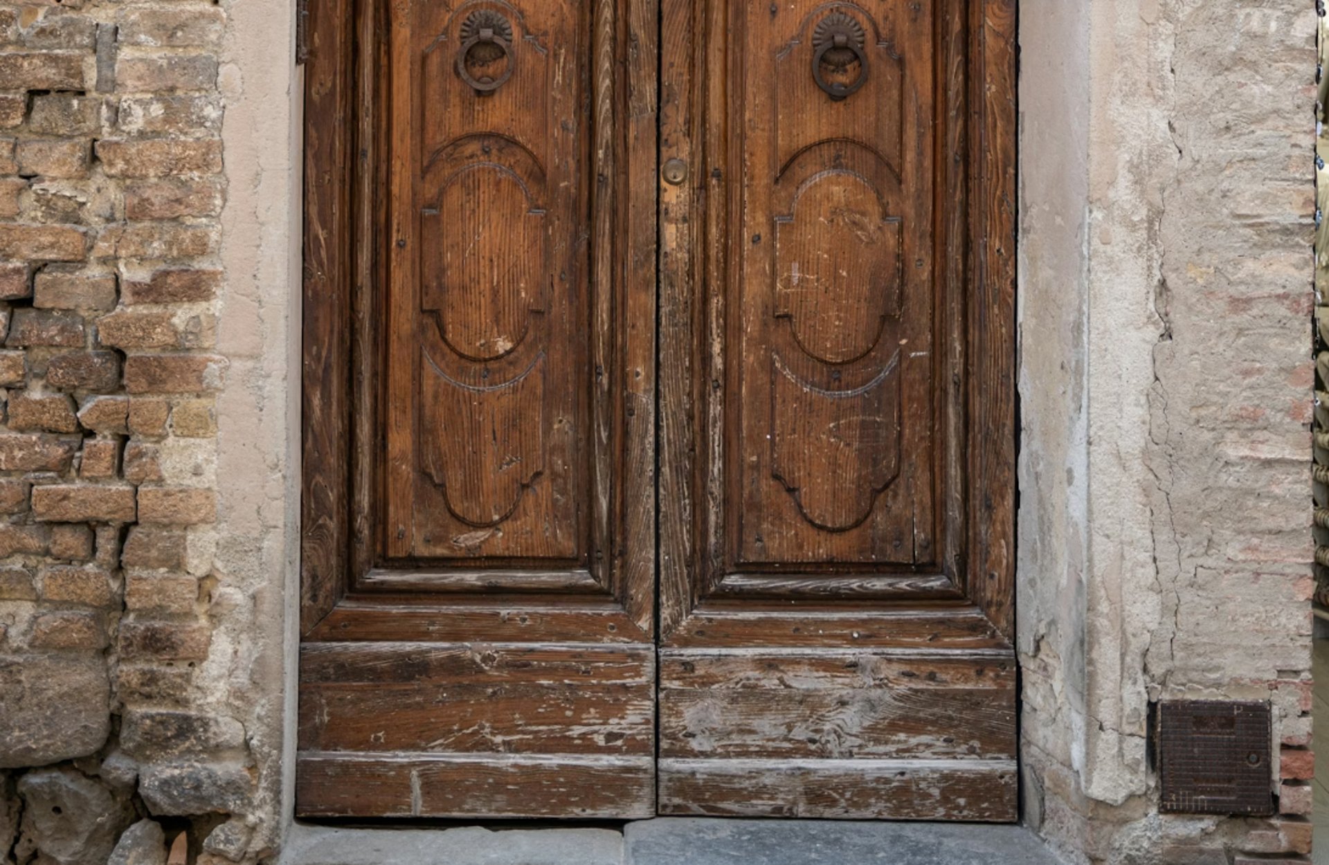 a toy ambulance is sitting on the floor