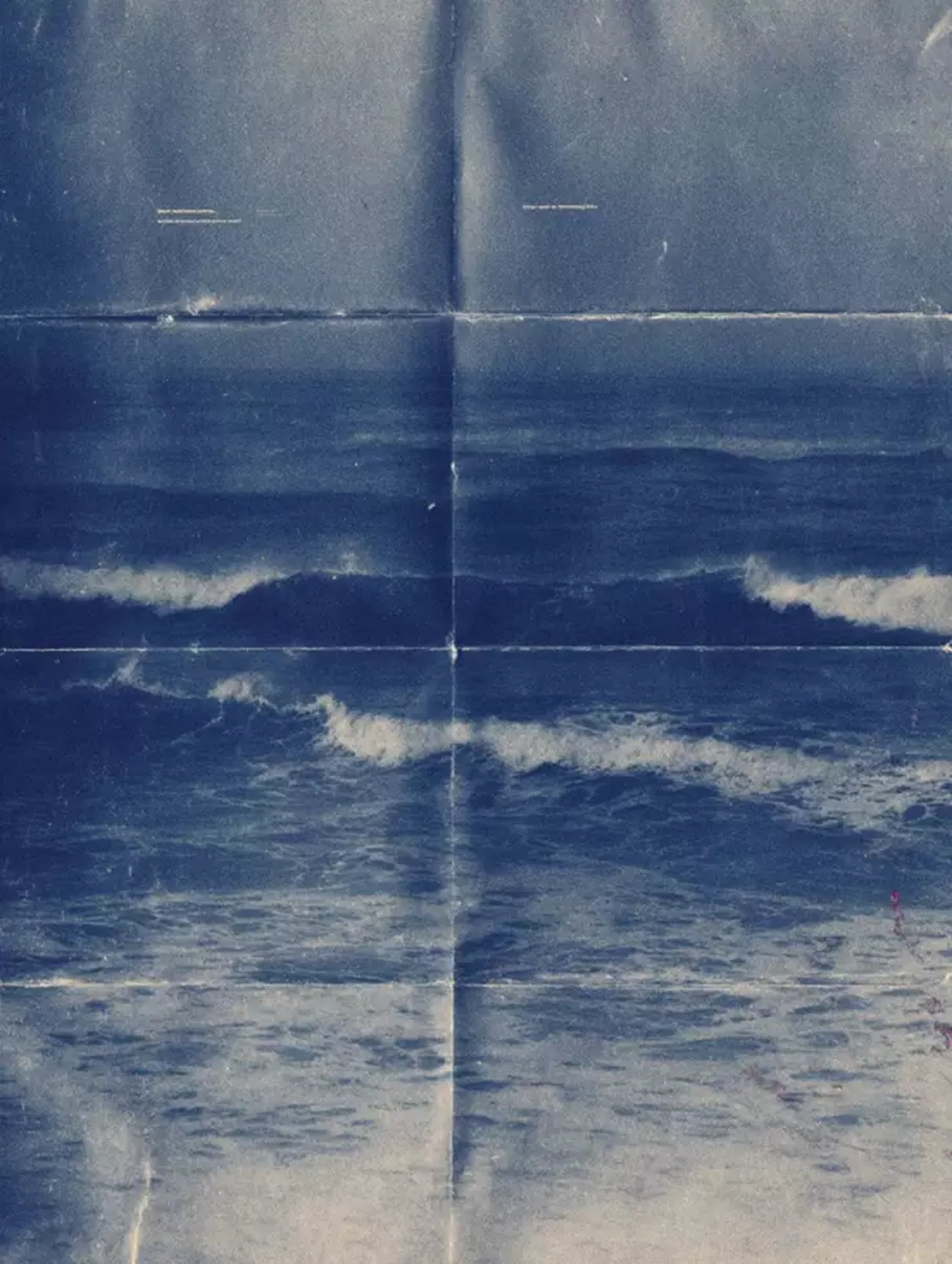 open book on top of several stacked books