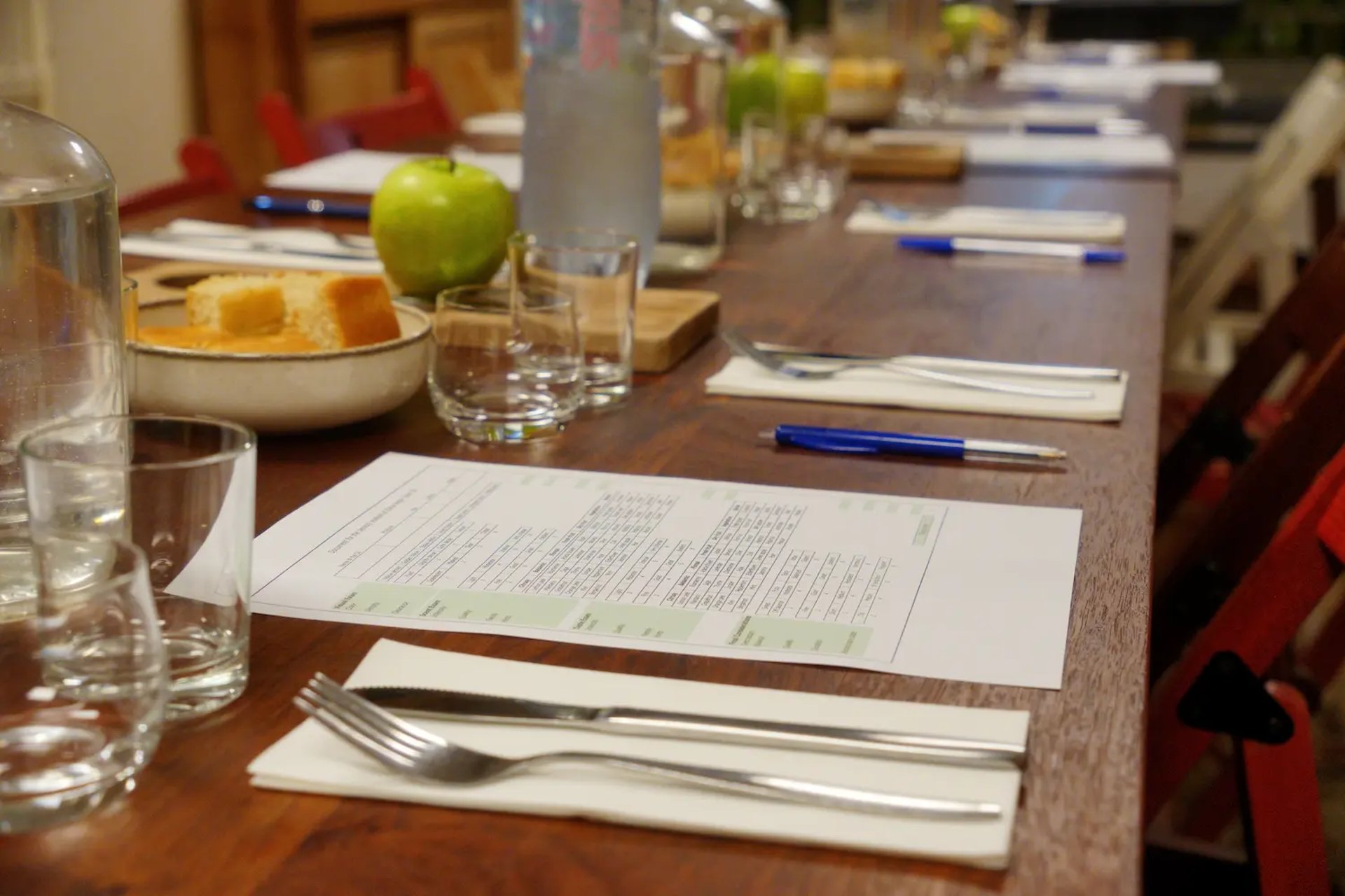 woman in black pants standing on window during daytime