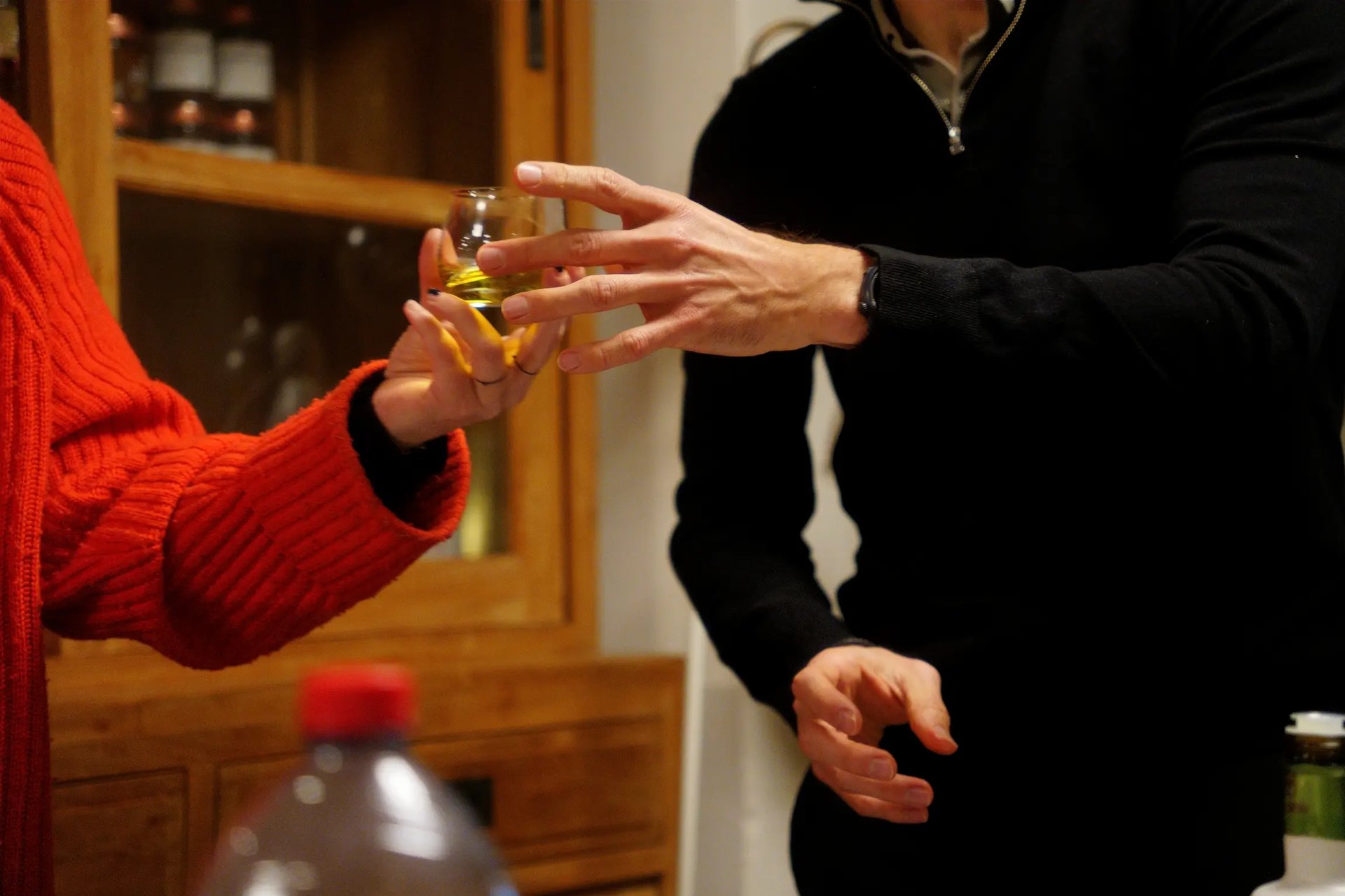 woman in black tank top and black leggings doing yoga