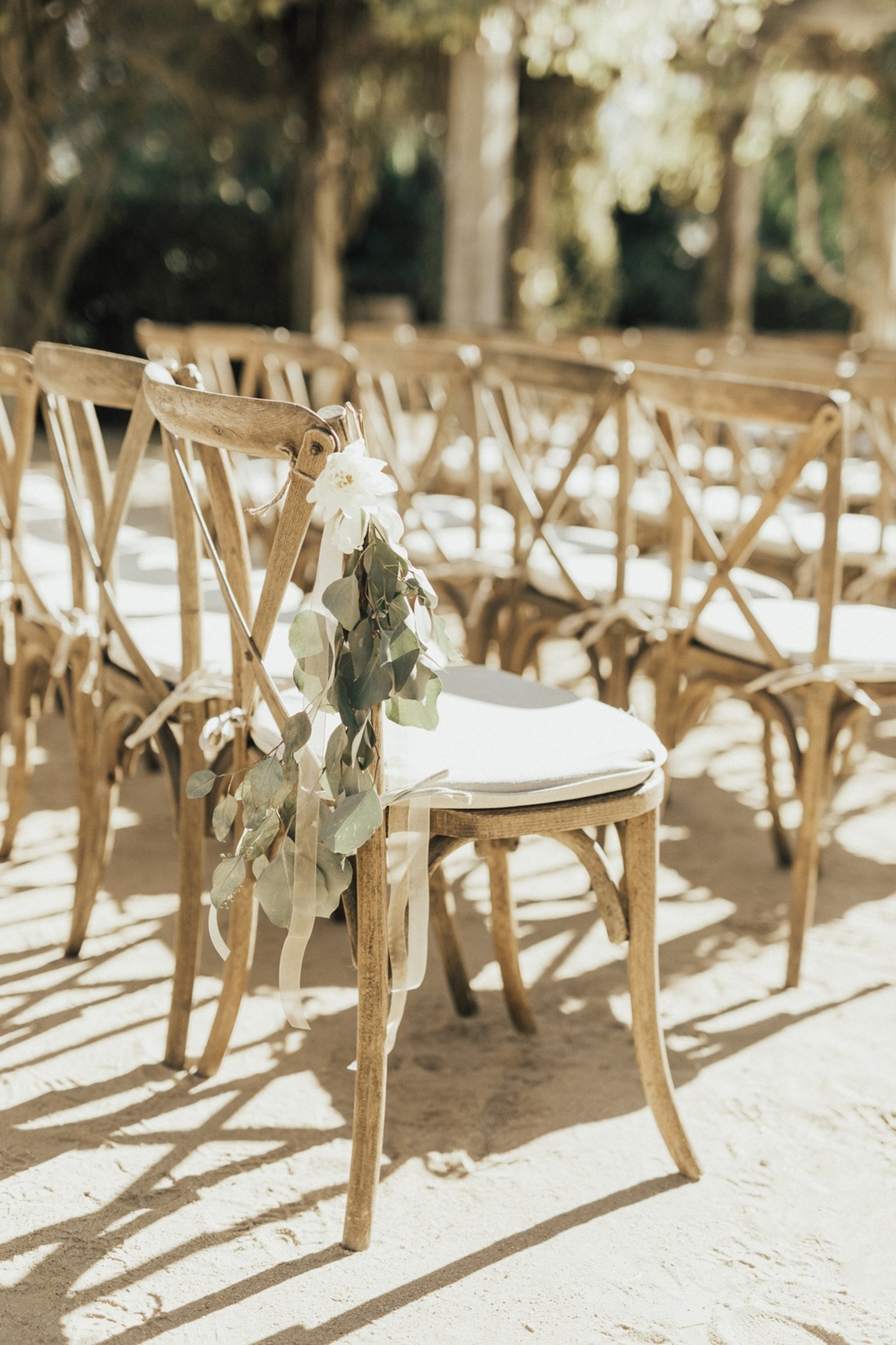 woman wearing yellow long-sleeved dress under white clouds and blue sky during daytime