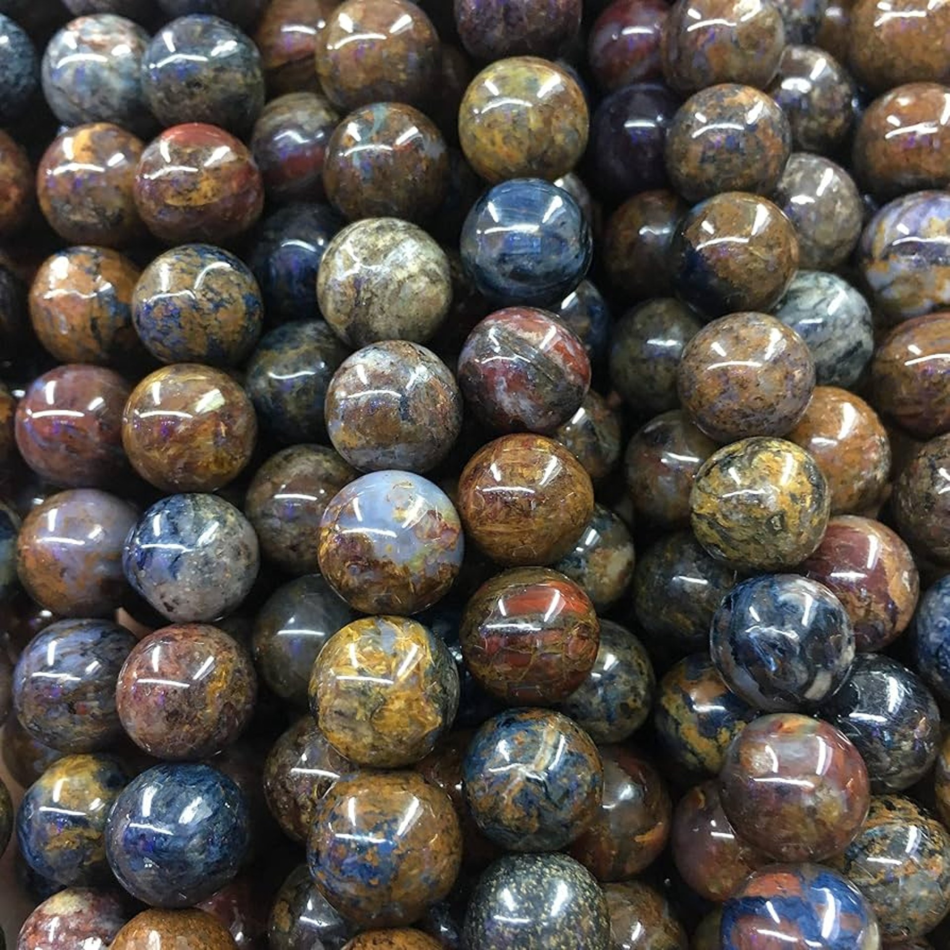a close up of a bracelet on a table
