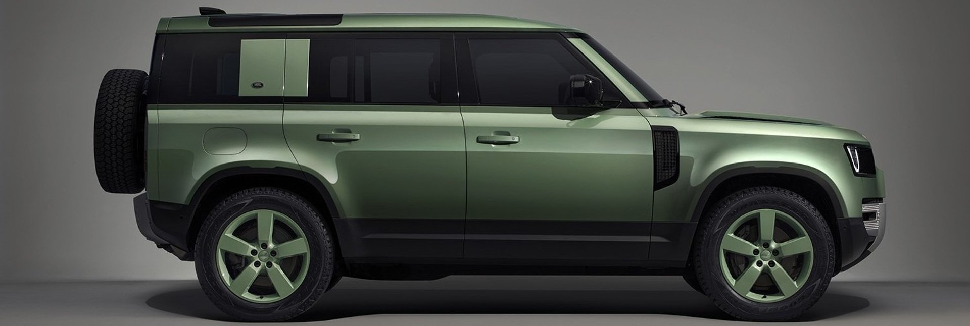 woman in black tank top and black leggings doing yoga