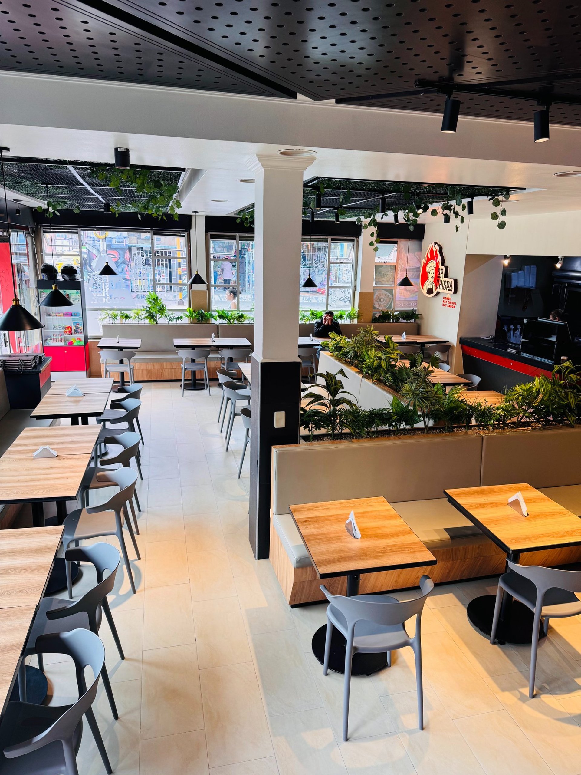 an abstract photo of a curved building with a blue sky in the background