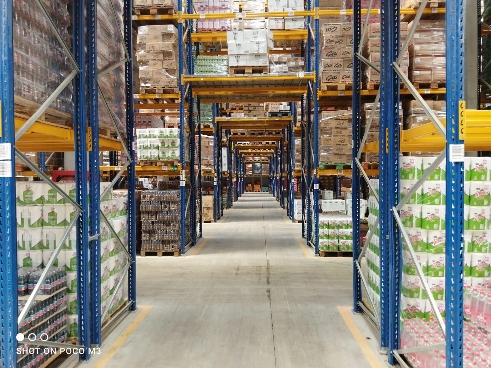 brown wooden shelf with books