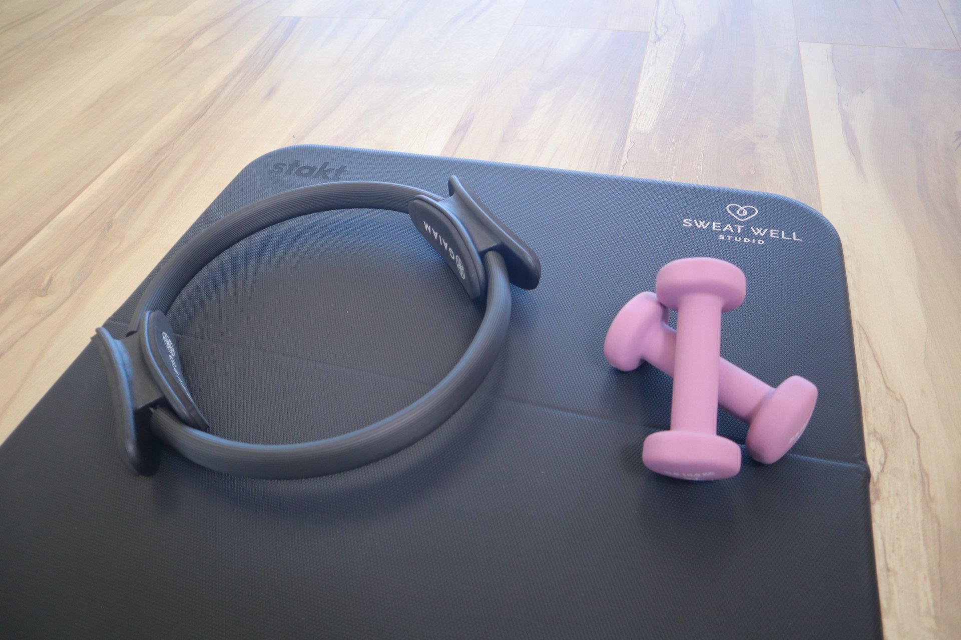 a yoga mat with two blocks on top of it