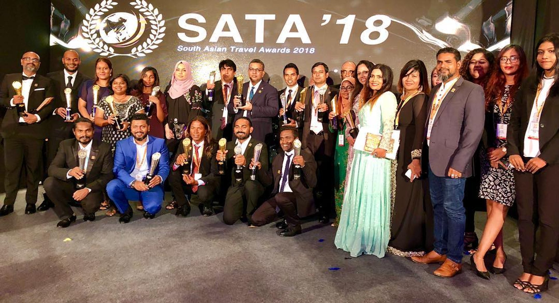 woman wearing yellow long-sleeved dress under white clouds and blue sky during daytime