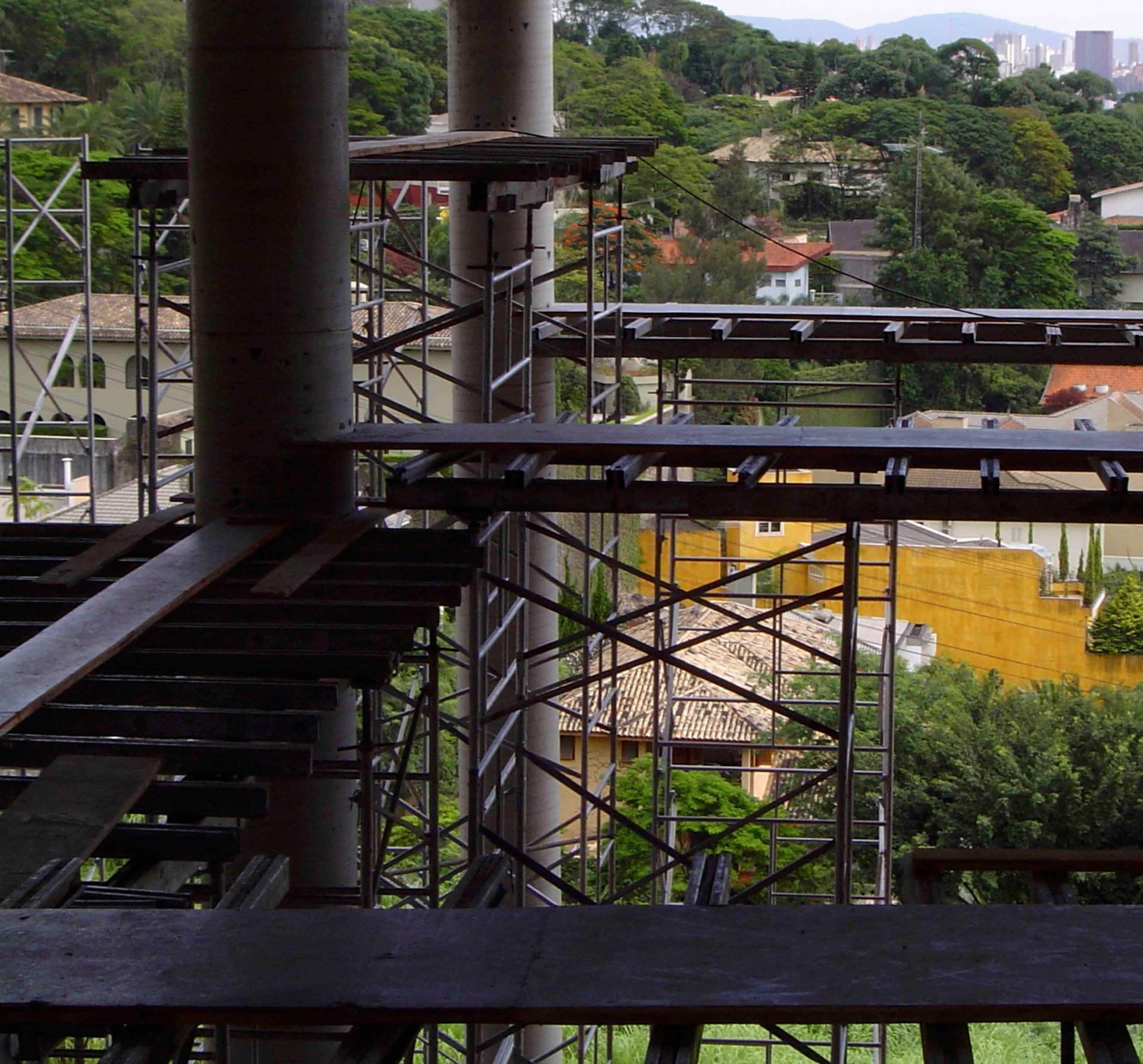 person wearing watch near laptop