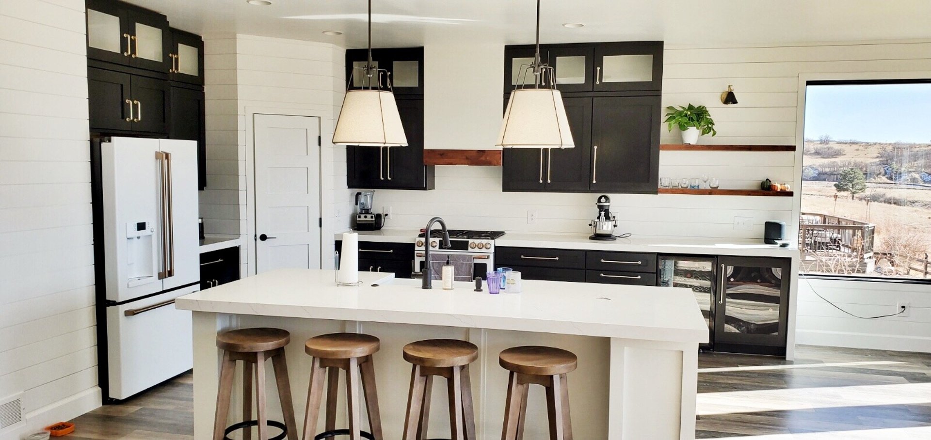 black and brown leather padded tub sofa