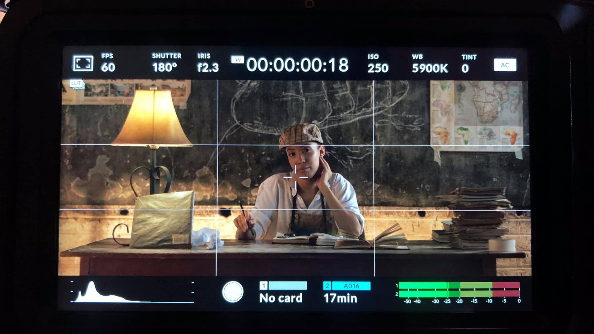 Cinematic frame of The Entomologist captured through a camera monitor on set.