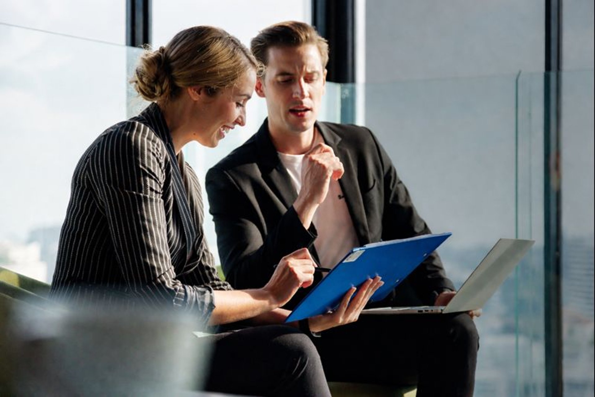 woman wearing yellow long-sleeved dress under white clouds and blue sky during daytime