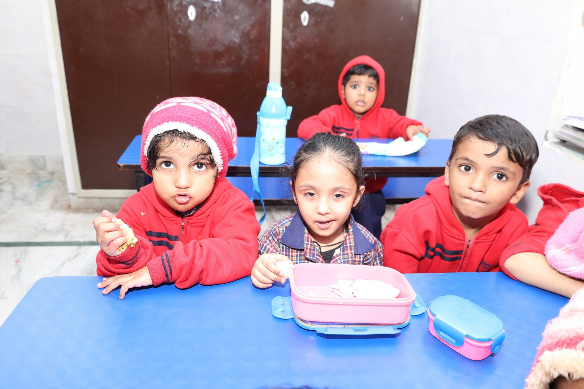 an abstract photo of a curved building with a blue sky in the background