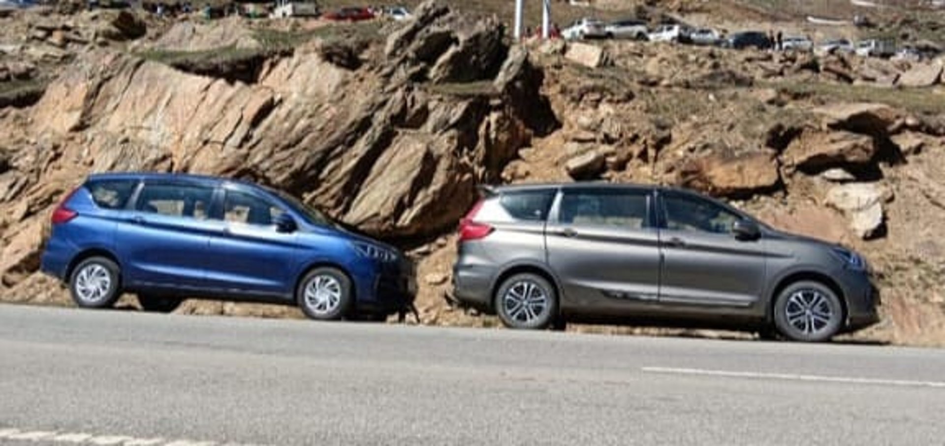 woman wearing yellow long-sleeved dress under white clouds and blue sky during daytime
