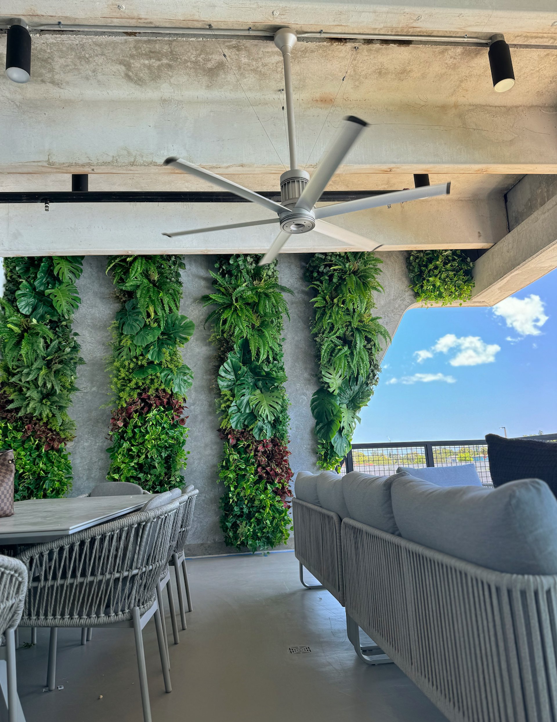 woman wearing yellow long-sleeved dress under white clouds and blue sky during daytime