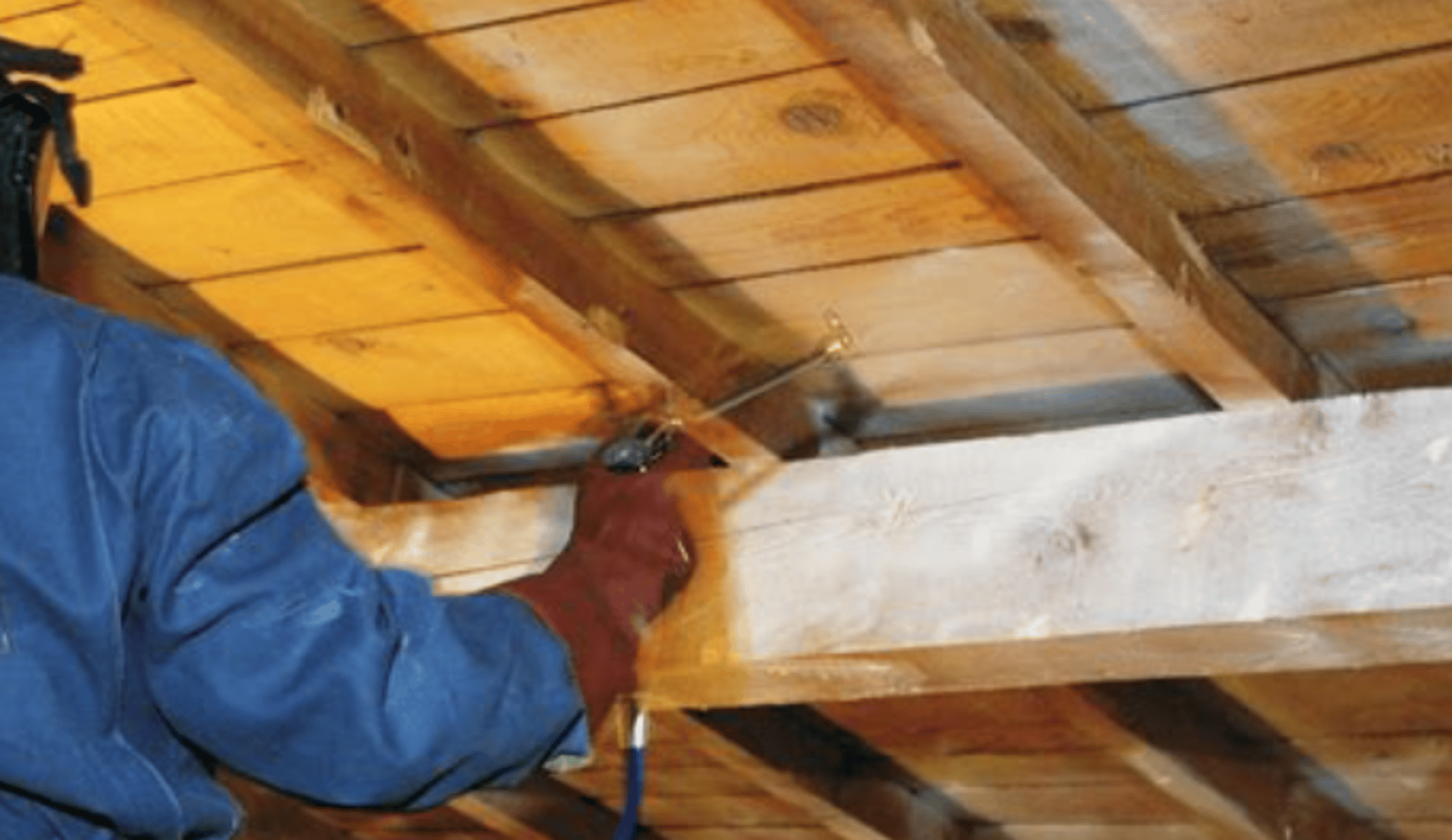 an abstract photo of a curved building with a blue sky in the background