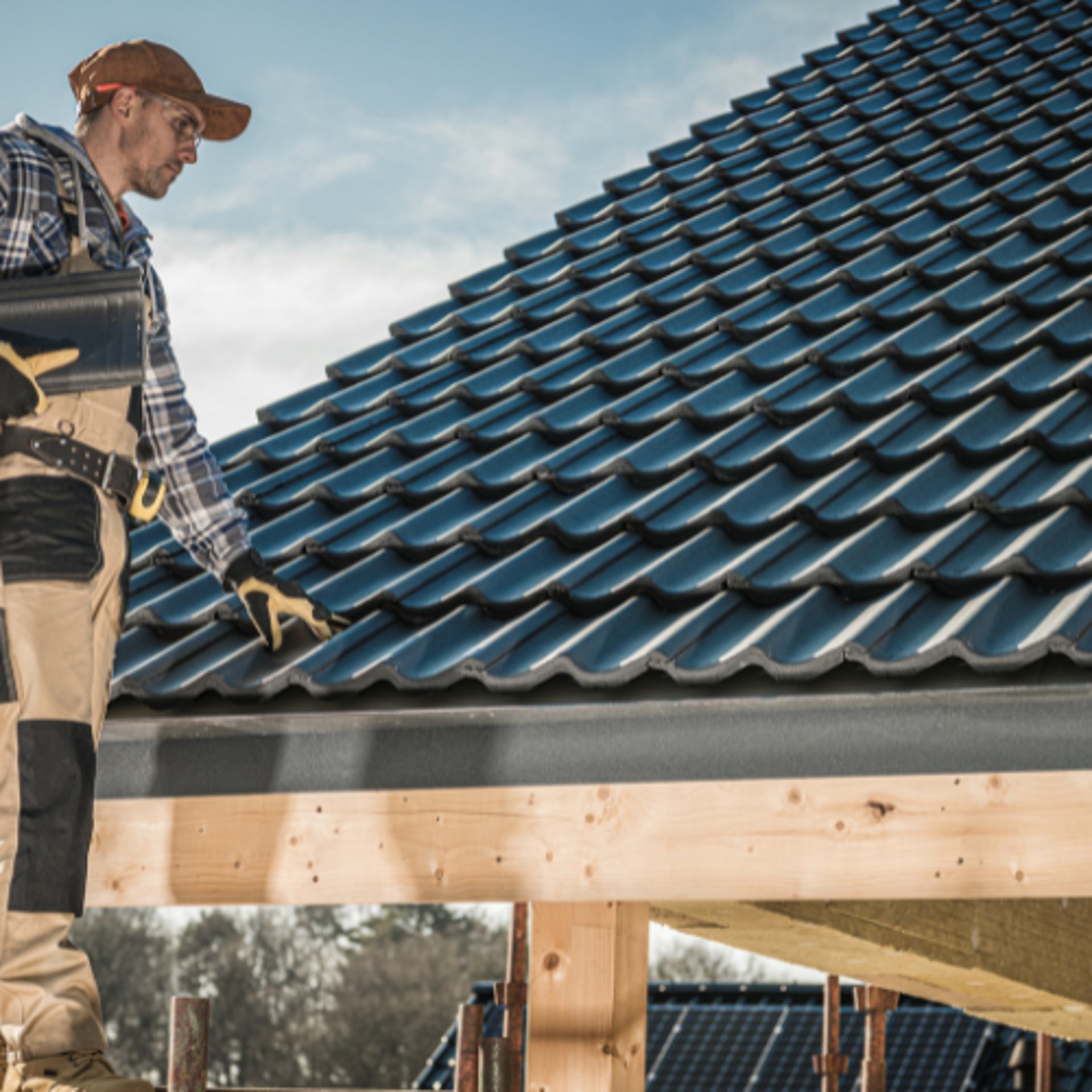 an abstract photo of a curved building with a blue sky in the background