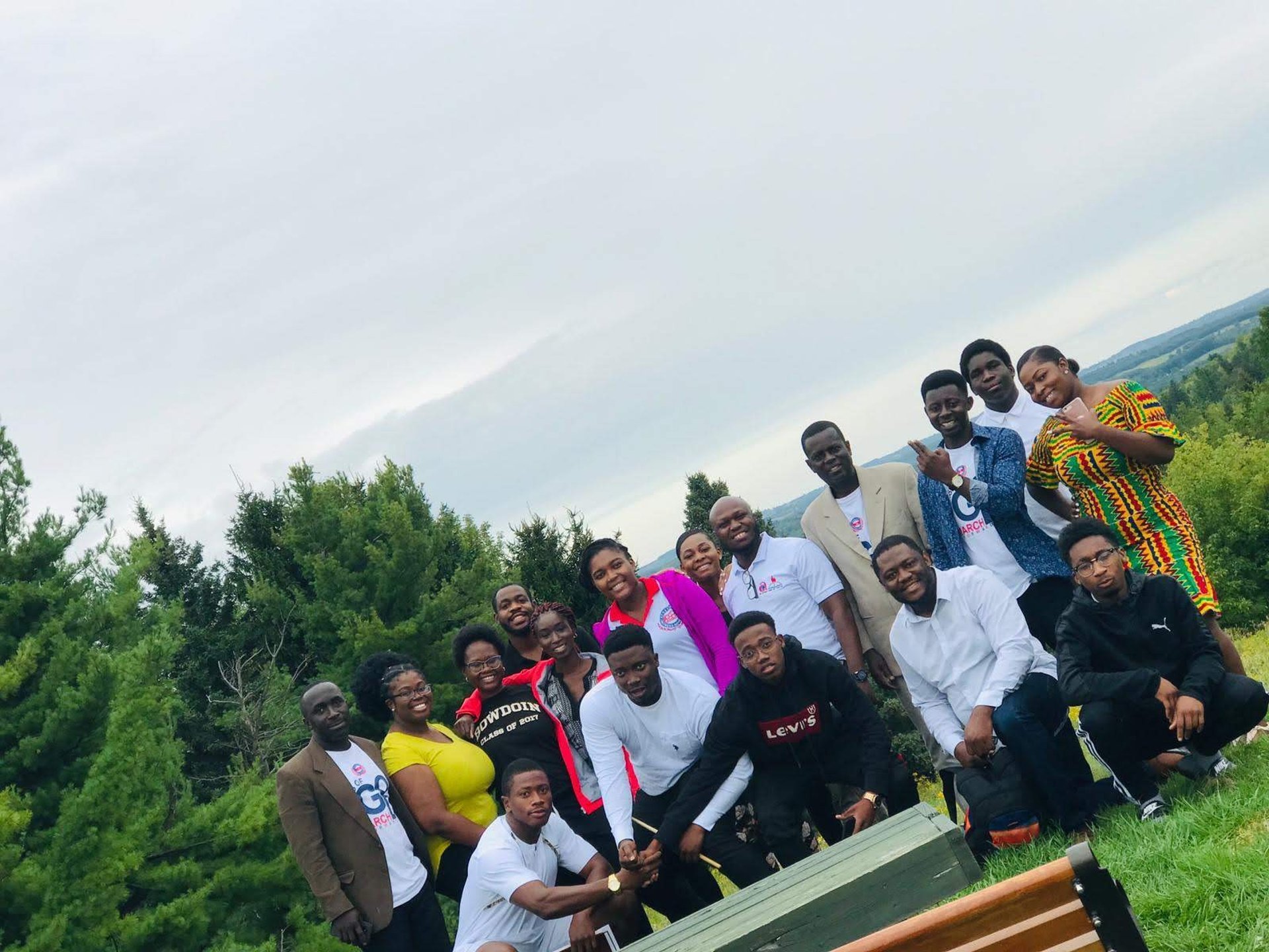 woman wearing yellow long-sleeved dress under white clouds and blue sky during daytime