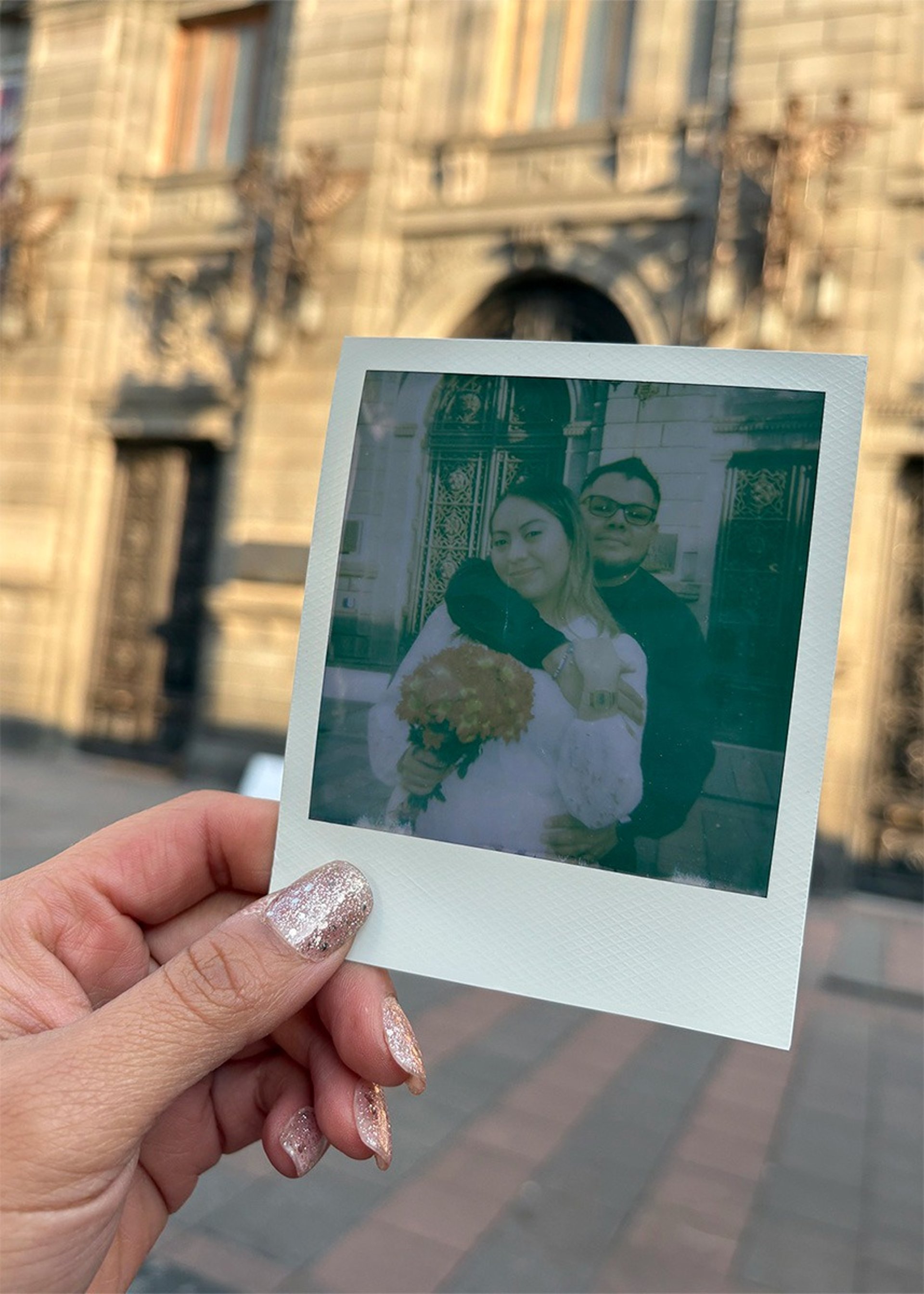 couple wearing silver-colored rings
