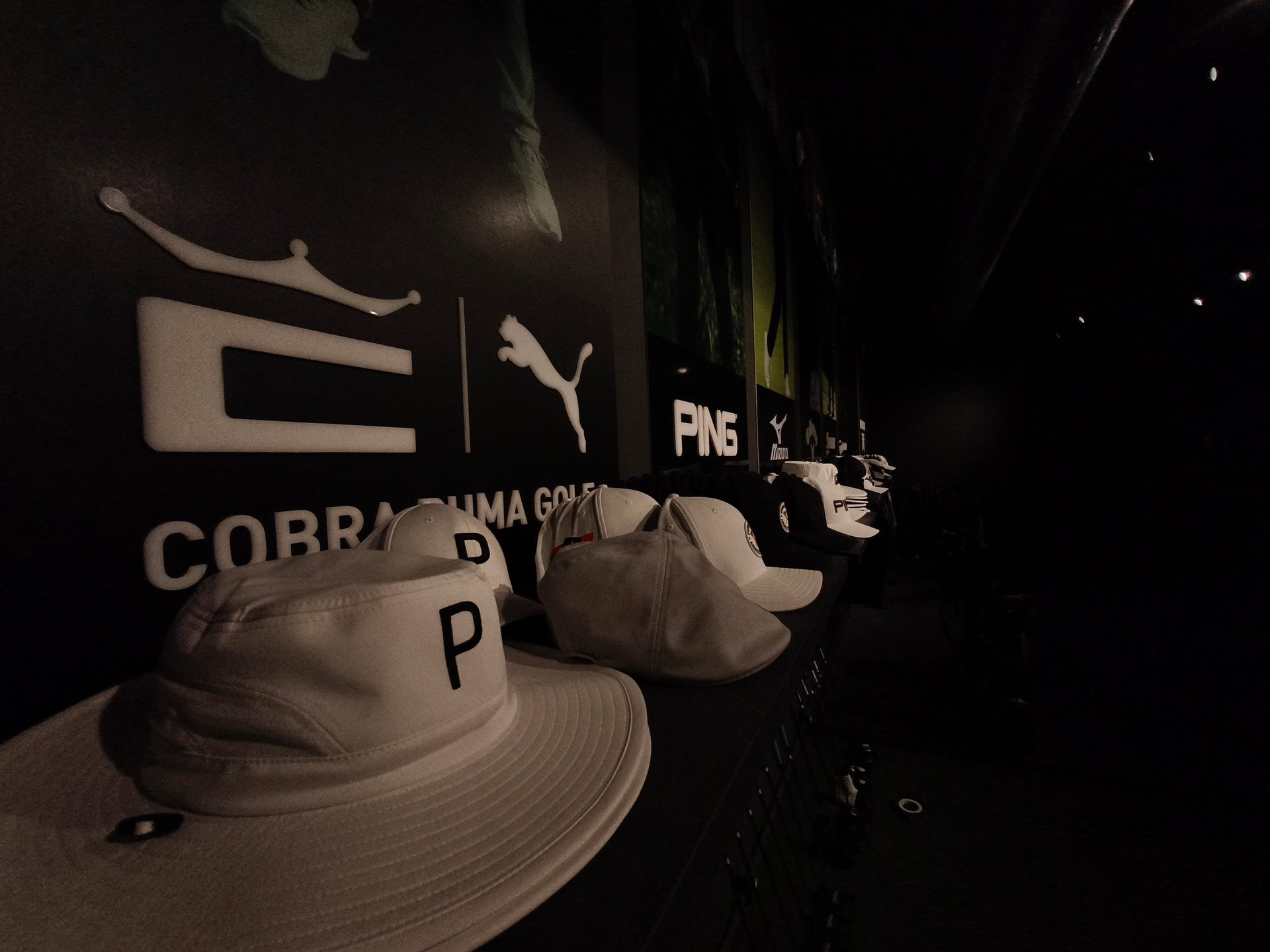 an abstract photo of a curved building with a blue sky in the background