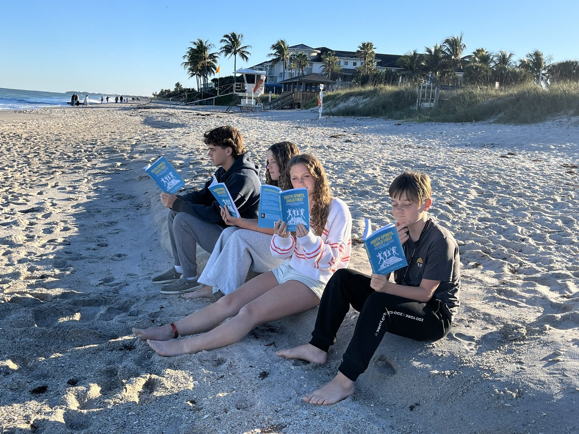 woman wearing yellow long-sleeved dress under white clouds and blue sky during daytime