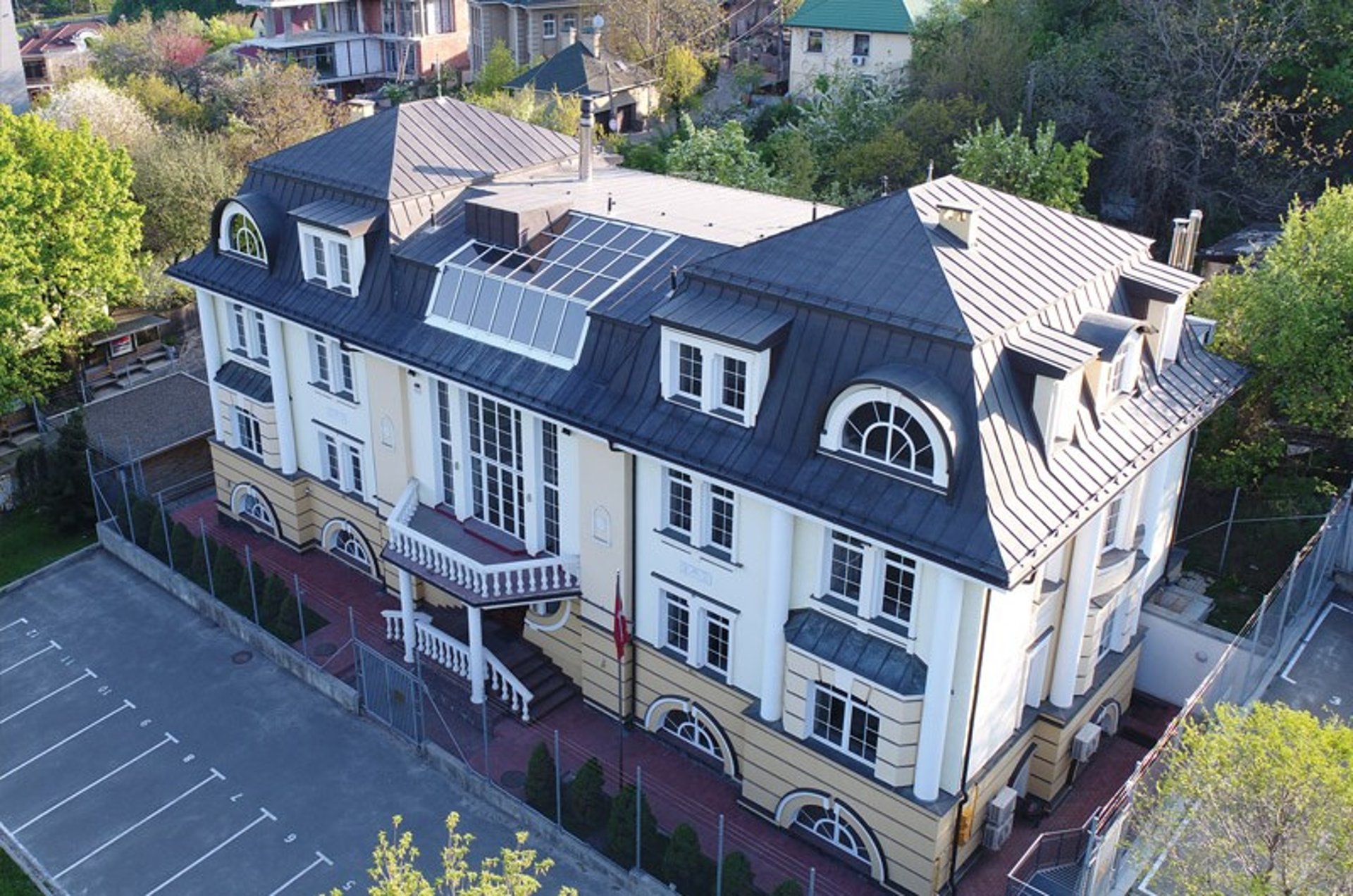green trees in glass building