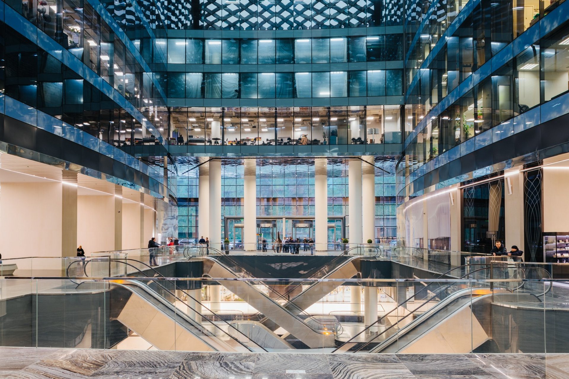 green trees in glass building