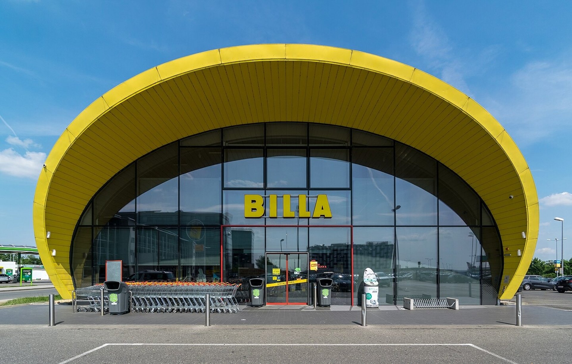 green trees in glass building