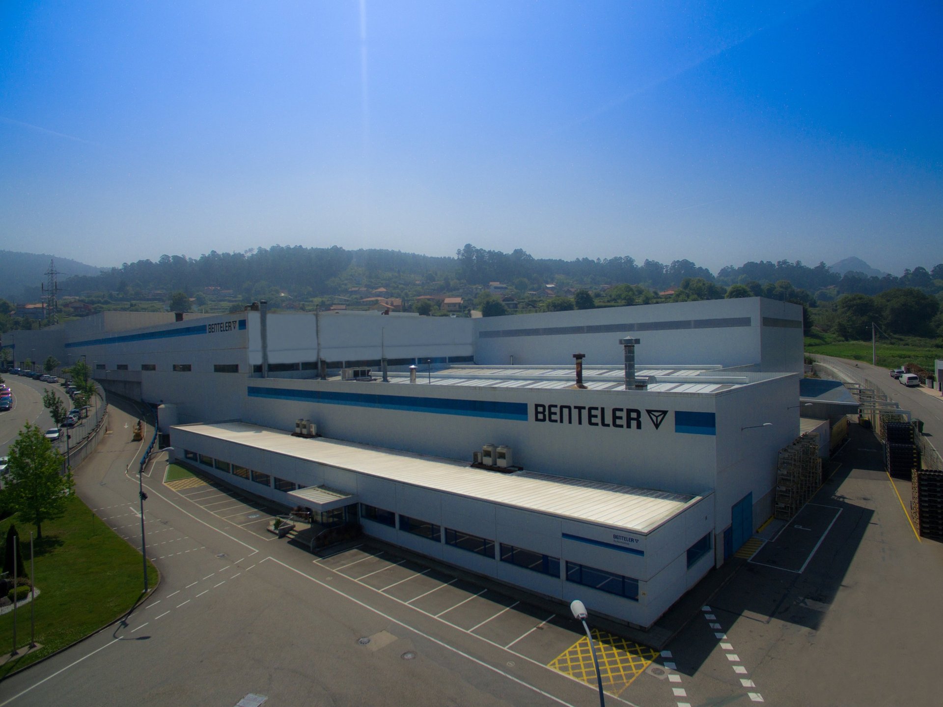green trees in glass building