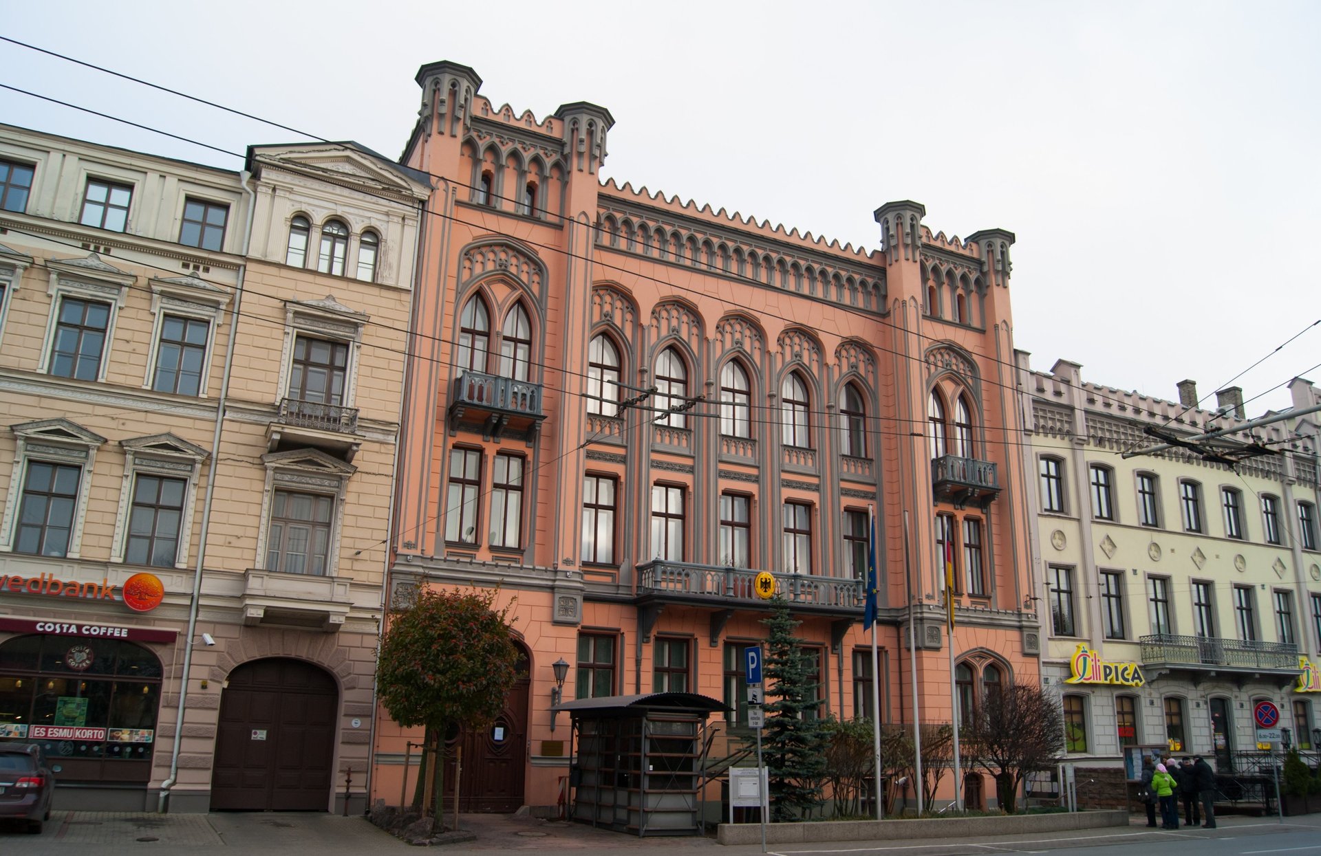 green trees in glass building